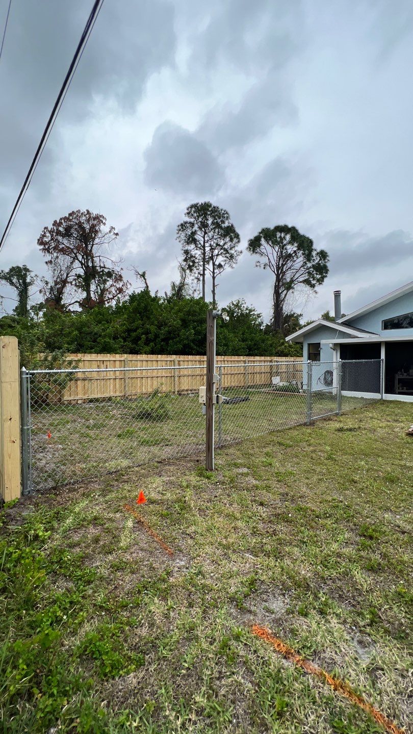 Wood Fence Installation using Wood and Chainlink Fence by Asap fence and gates, LLC