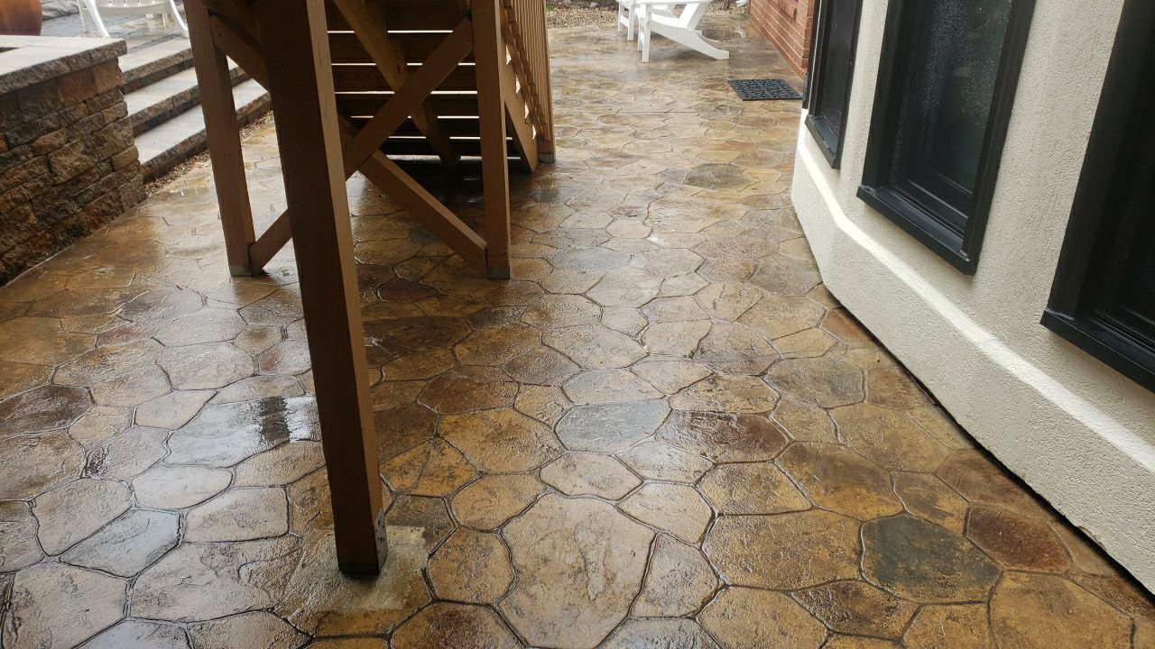 patio cleaning using cleaner by Power Wash Masters LLC
