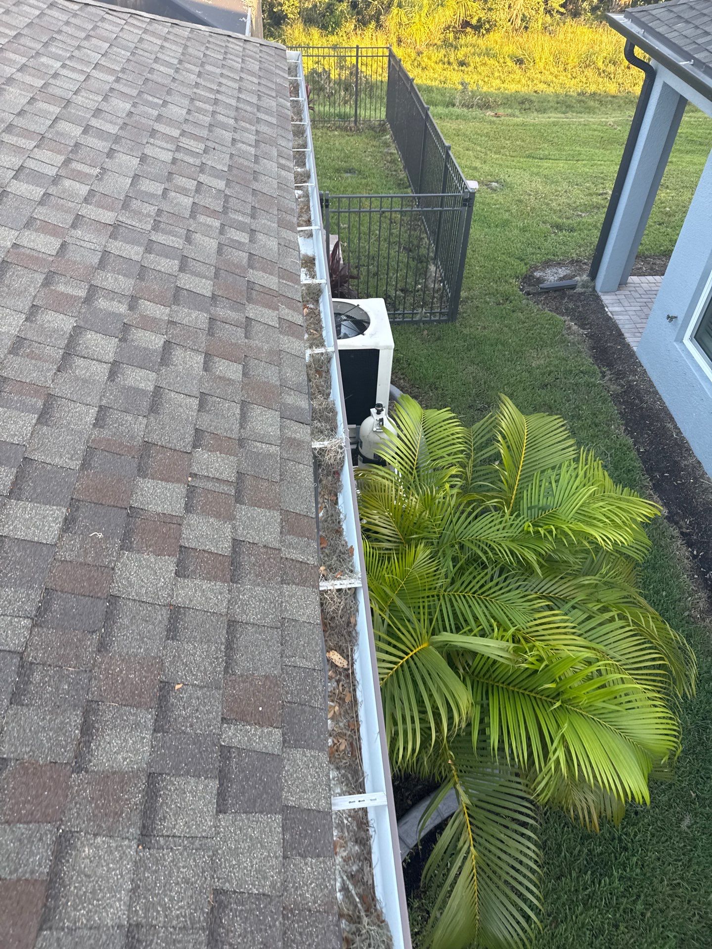 Post-Hurricane Gutter and Screen Enclosure Cleaning in Palmetto, FL | Trevesta Community by Sunshine AquaWash