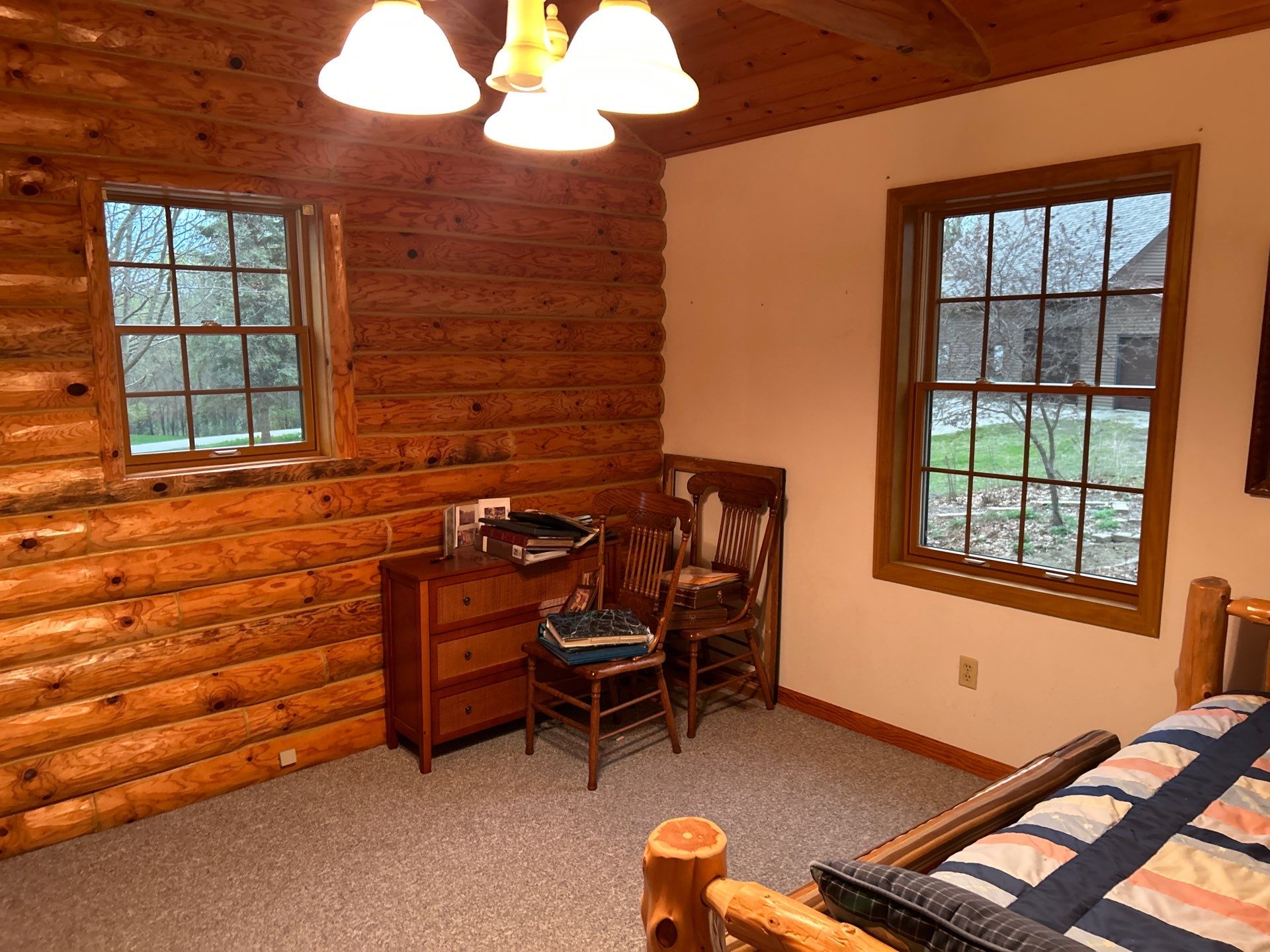 Pella Window installation using Pella Lifestyle wood/Aluminum window by United Windows and Siding LLC