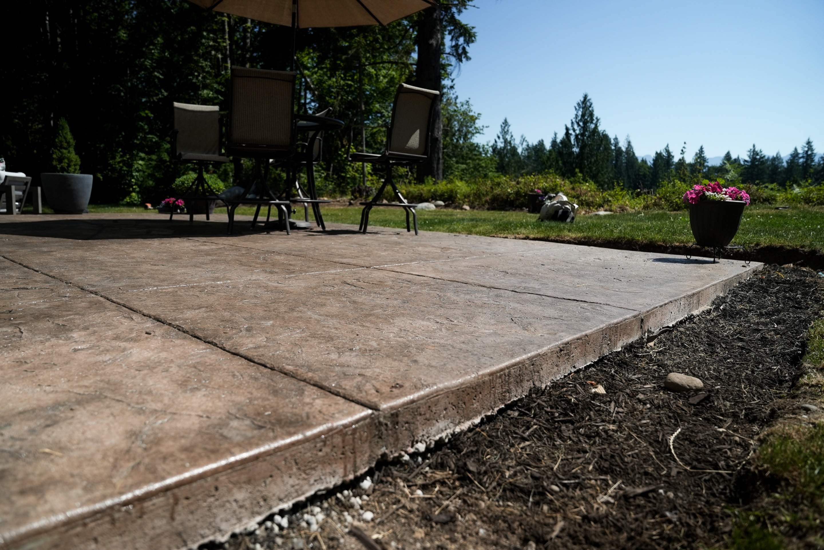 Mandy | Stamped Concrete Patio & Driveway by Jireh Asphalt & Concrete Inc 