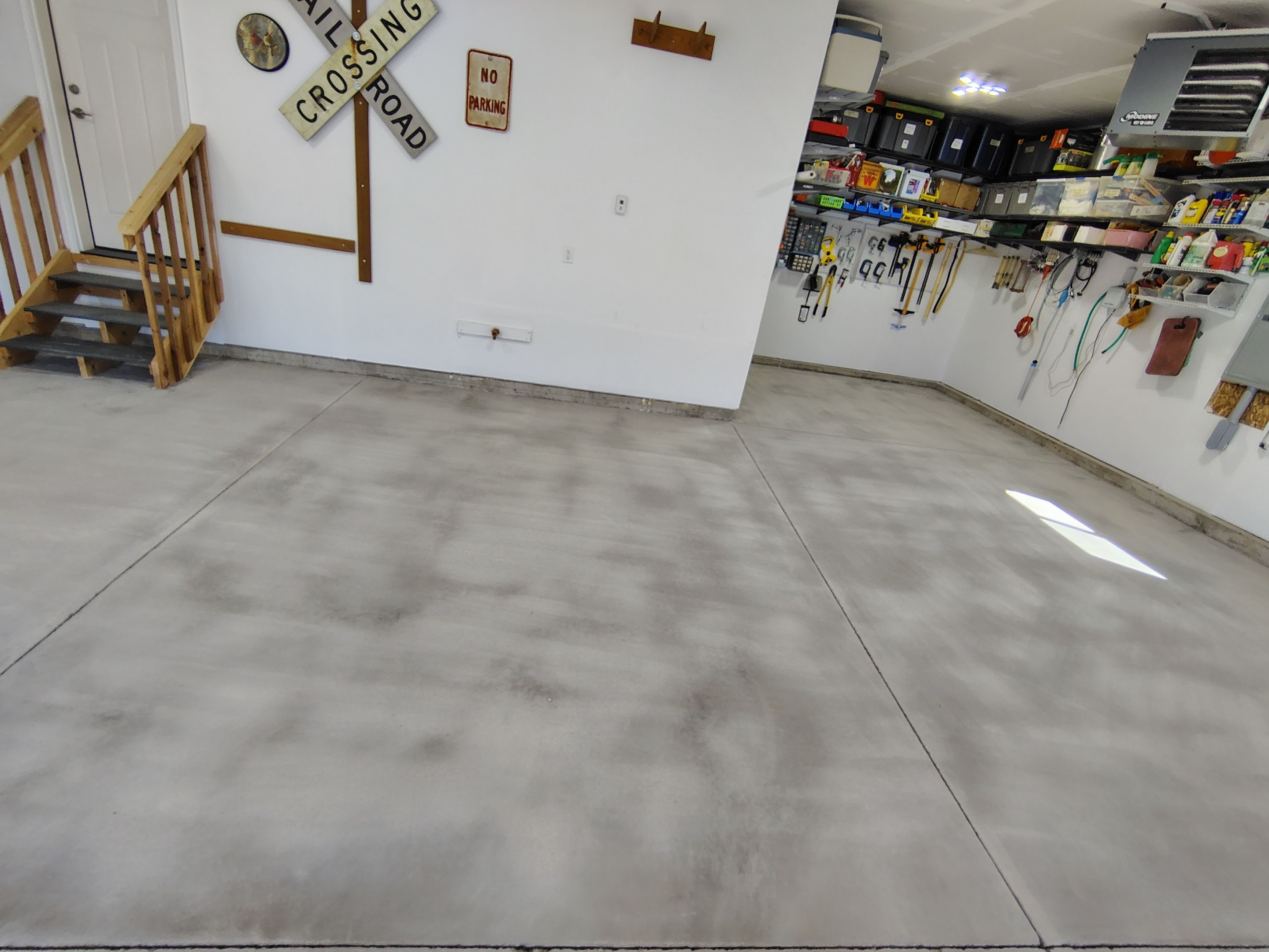 Decorative Flake Garage Floor Coating Installation in Tea, South Dakota by Select Painting, Coatings & Garage Cabinets