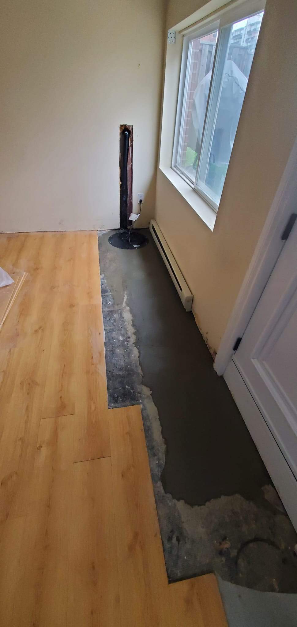 Sump Pump with catch basin install by Canada Waterproofers Inc