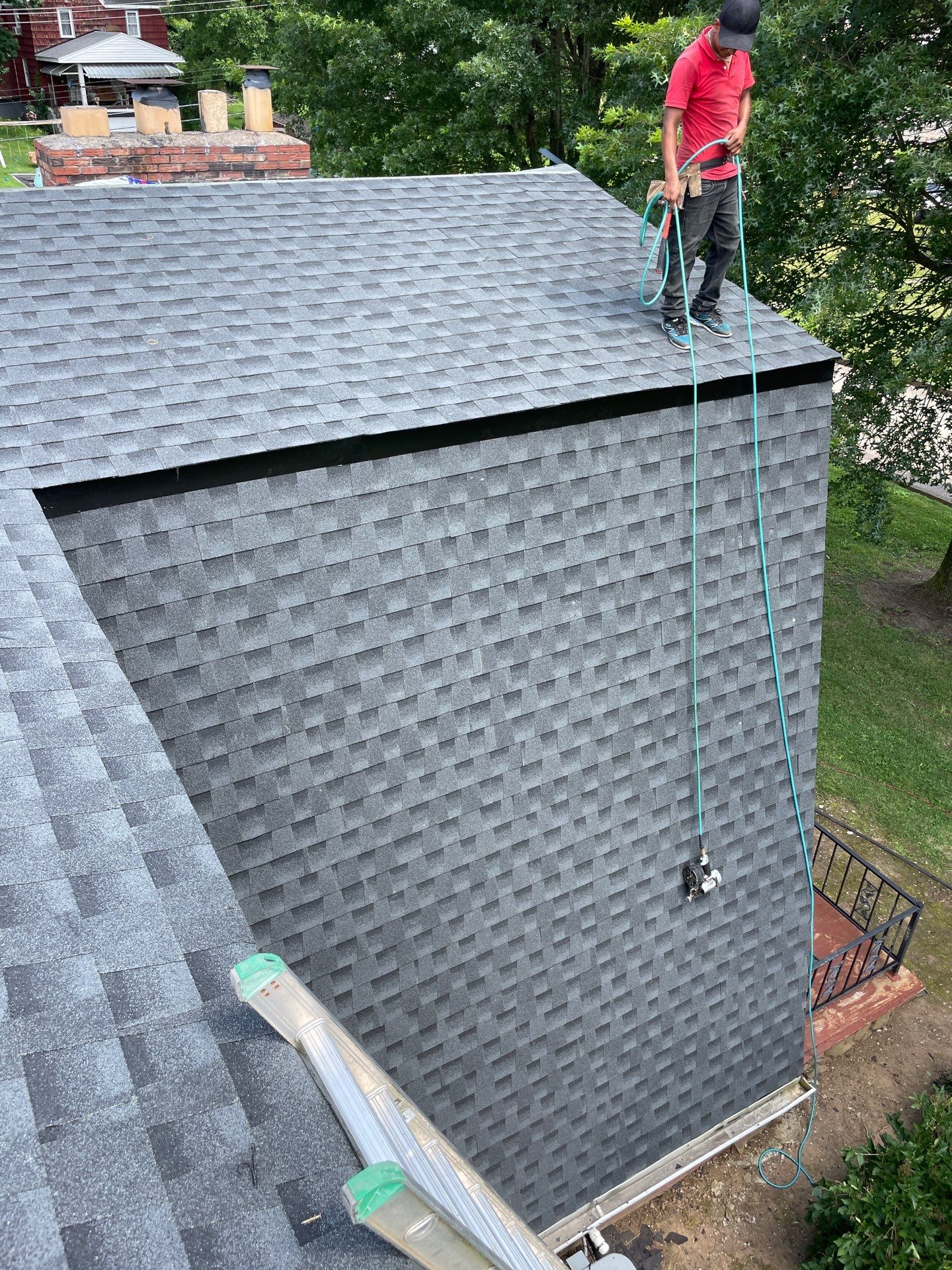 Residential Roofing Installation using GAF Timberline HDZ Charcoal by Rainstoppers Roofing