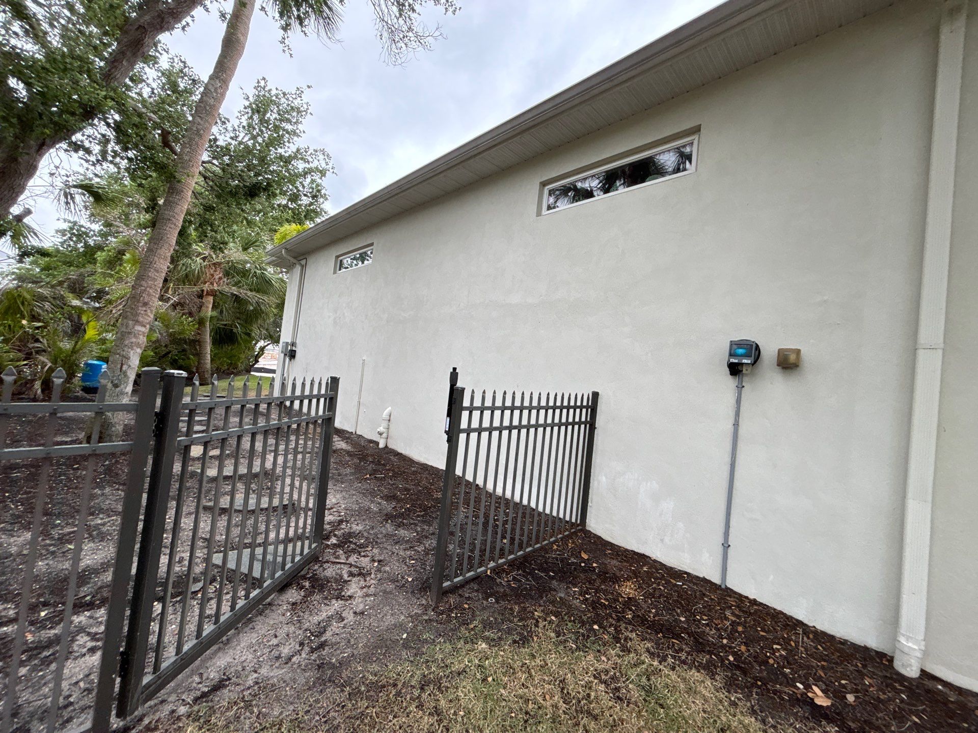 6-Inch White Seamless Gutters Installation in Siesta Key FL by Gutter Professors