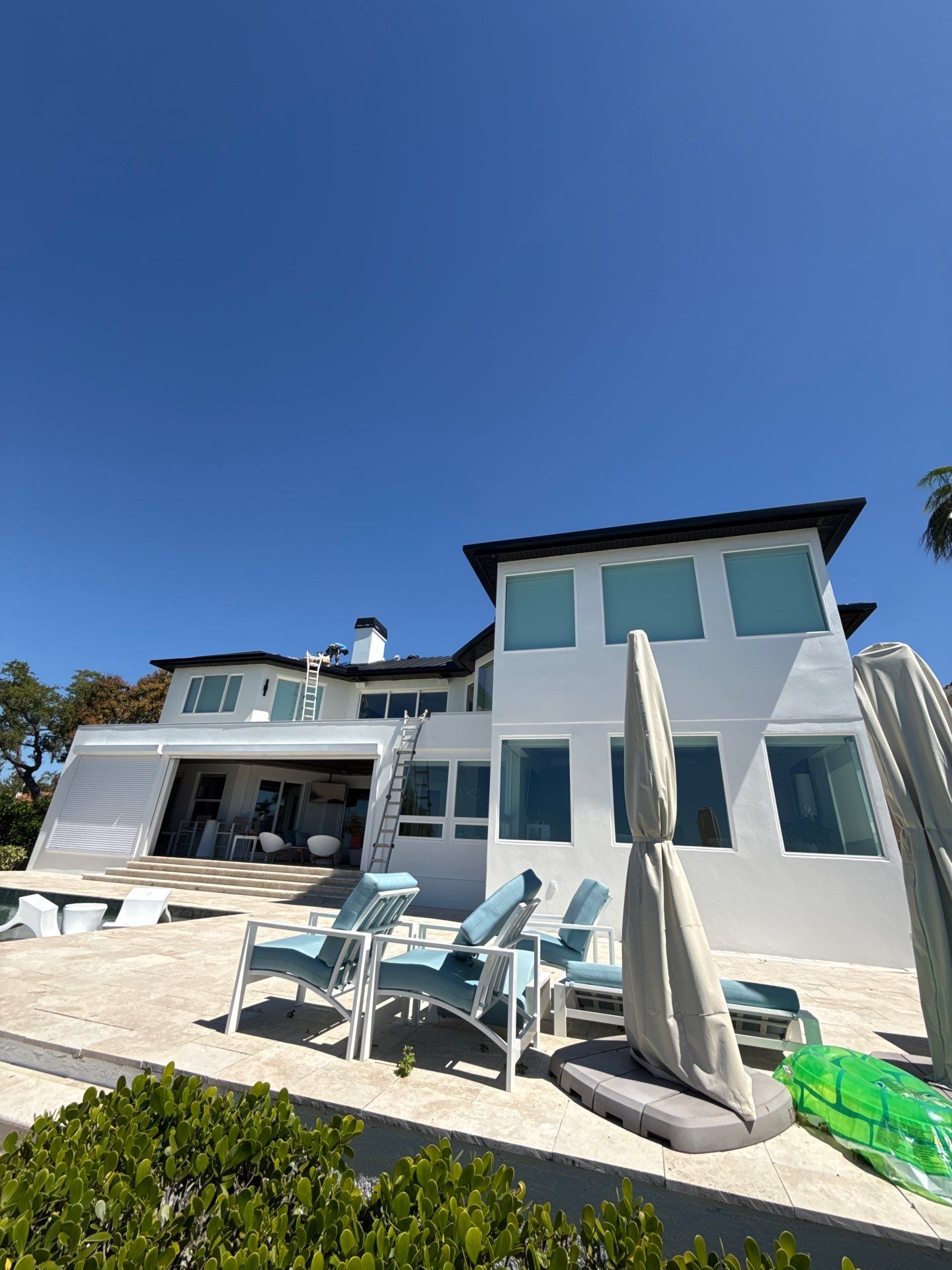 Soffit and Fascia Installation and black seamless gutters in Sarasota FL by Gutter Professors