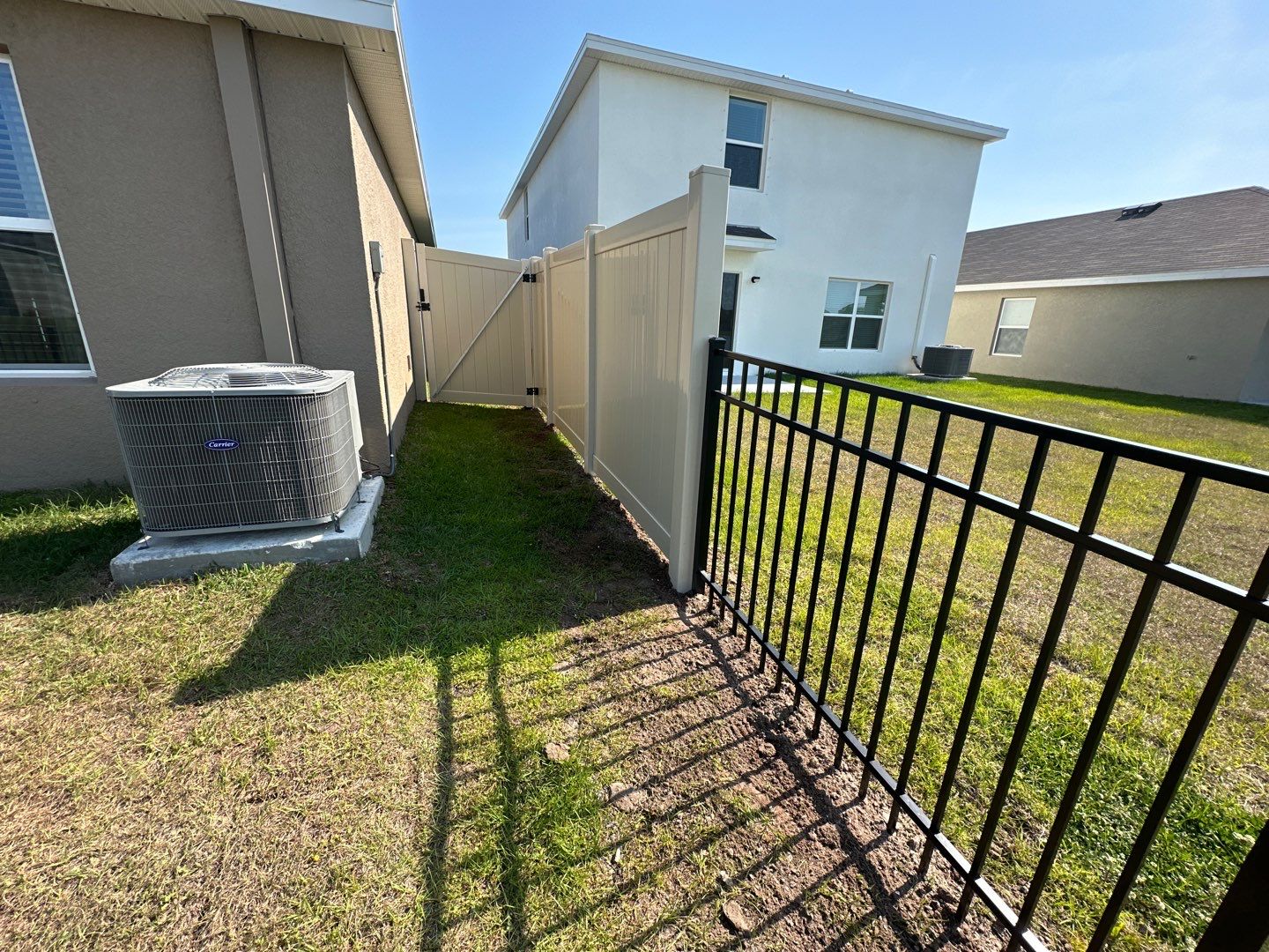 Aluminum Fence Installation using Vinyl Fence and Black 3 Rail Aluminum Fence  by Asap fence and gates, LLC