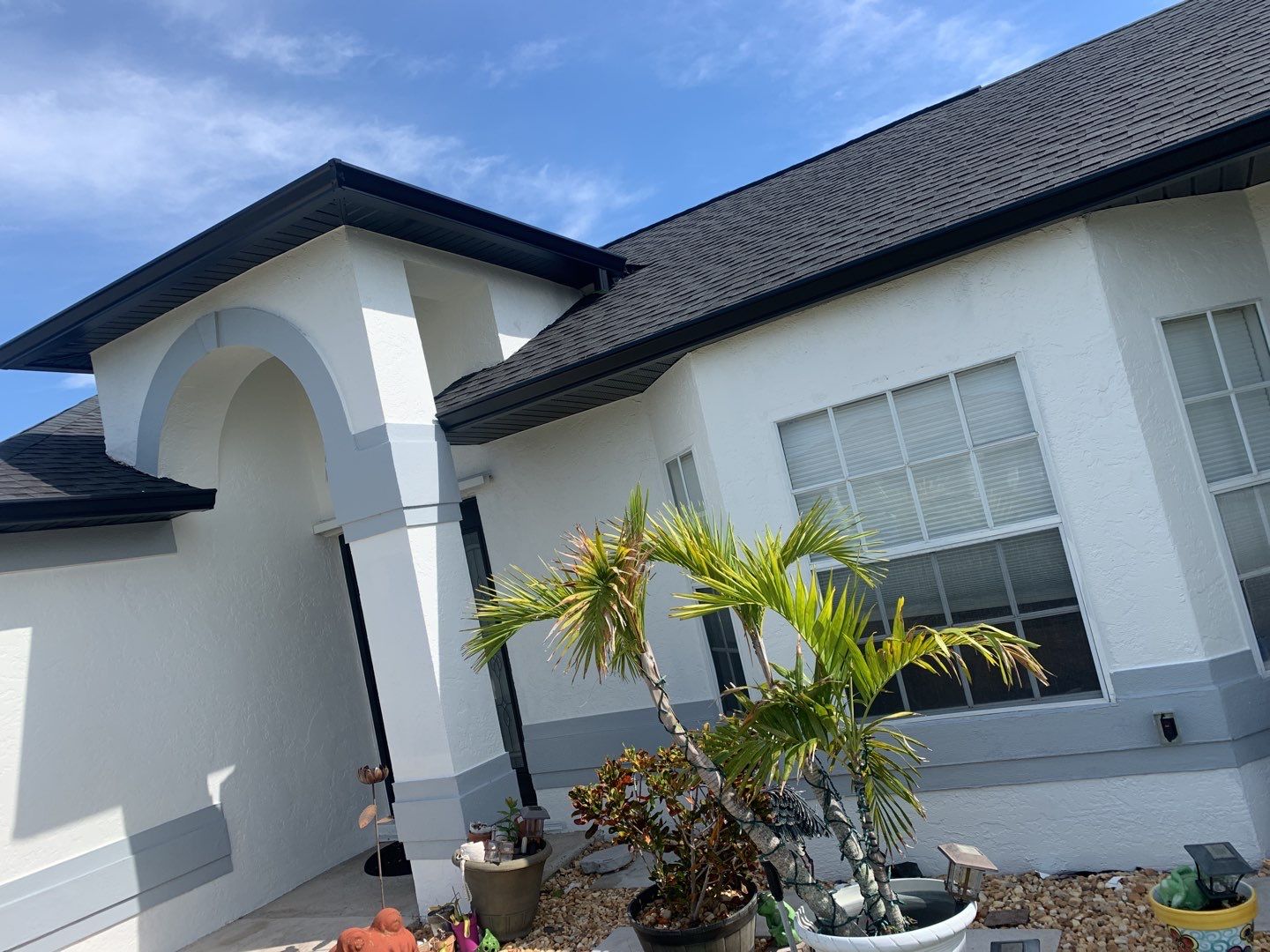 Black Seamless Gutters for Modern Cape Coral Homes by Gutter Professors