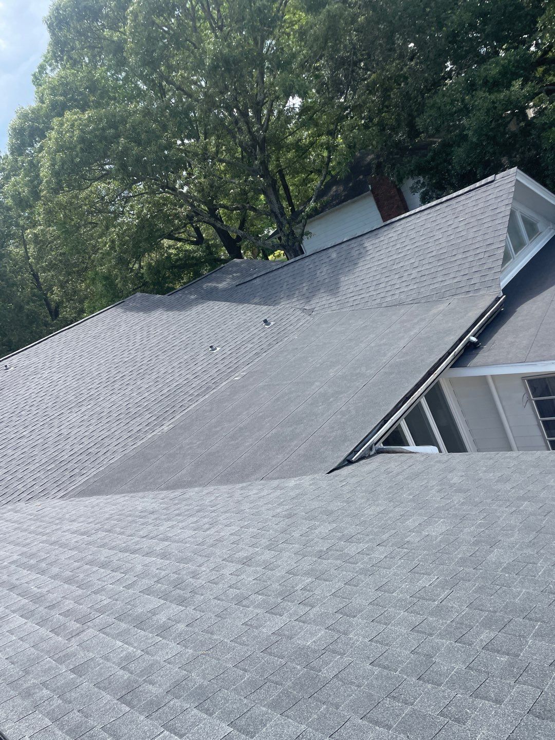 Residential Roofing Installation using Roof Replacement by American Roofing & Construction LLC