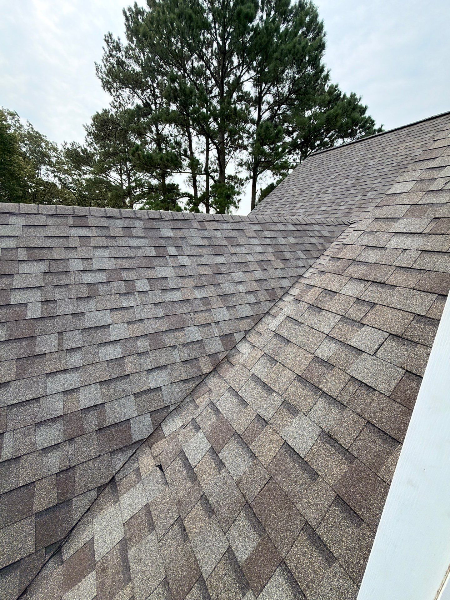 Roof Replacement and White Gutter Installation in Gloucester by Cade Construction