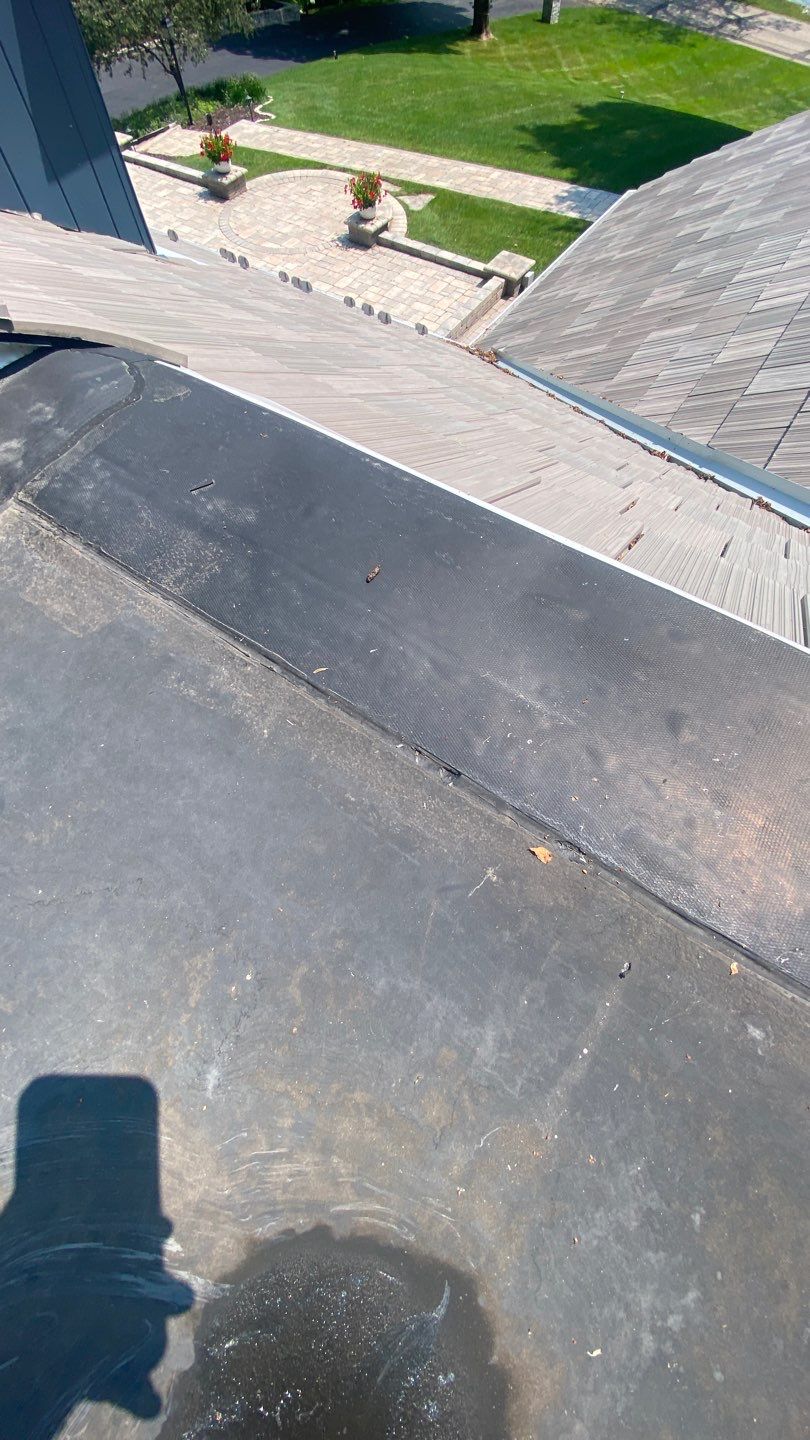 DaVinci Roof Installation with Snow Guards in Oconomowoc Lake by Custom Installations