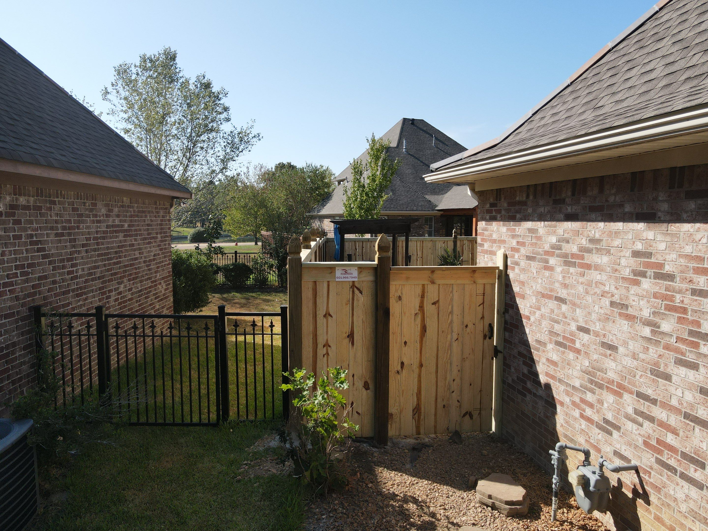 6ft Treated Pine Good Neighbor Fence 6x6 French Gothic Posts by Roberson Construction LLC