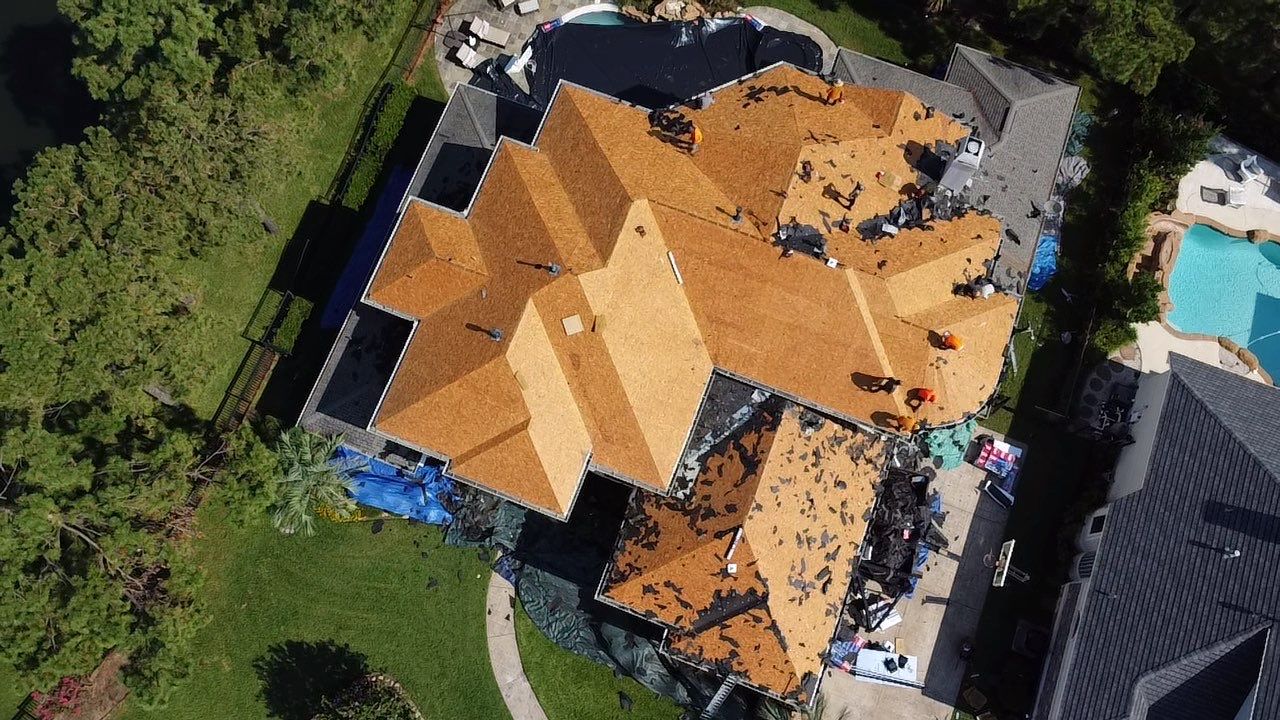 GAF HDZ Charcoal Roof Installation for Elegant Houston Home by Houston Roofing & Construction