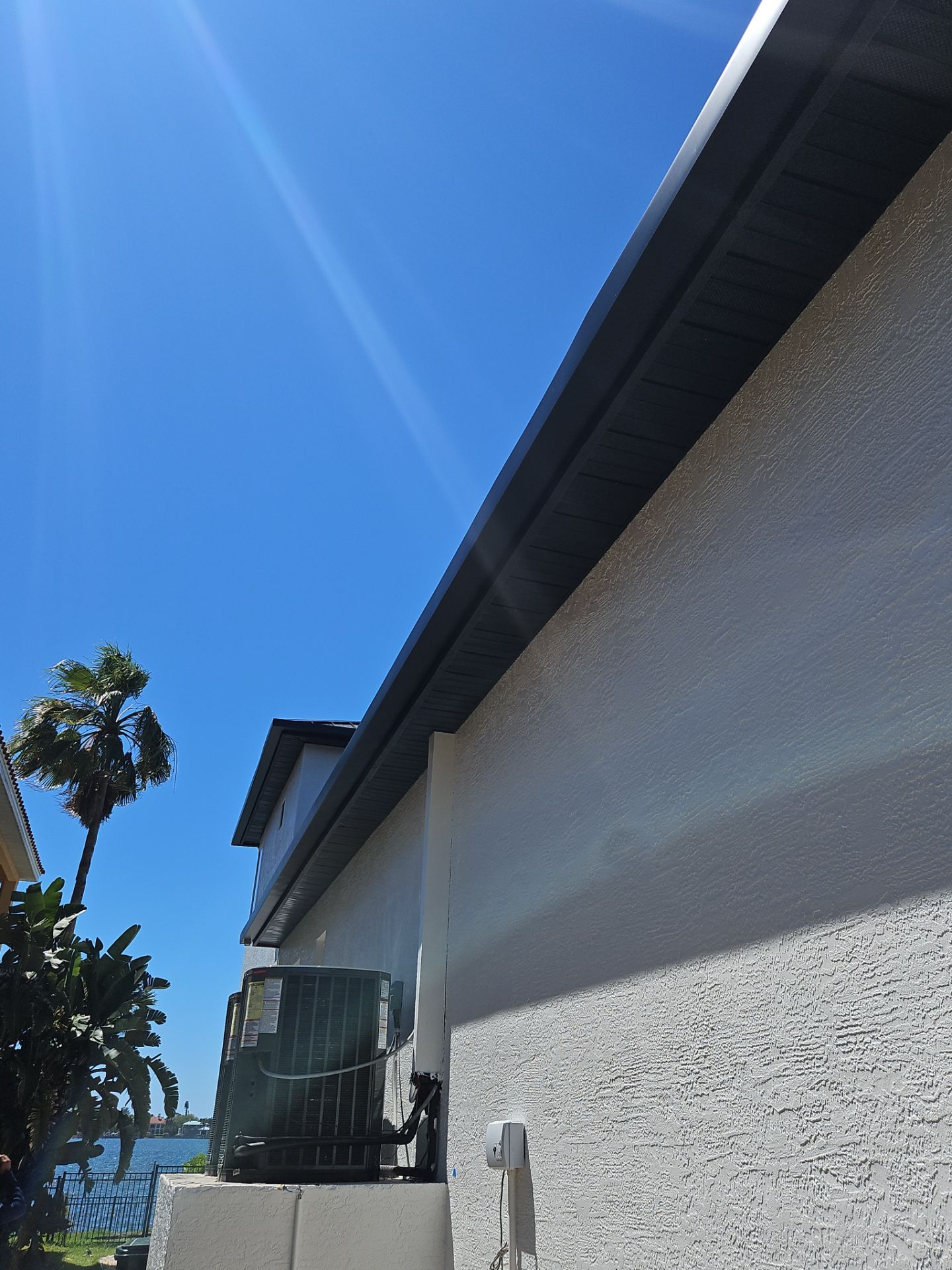 Soffit and Fascia Installation and black seamless gutters in Sarasota FL by Gutter Professors