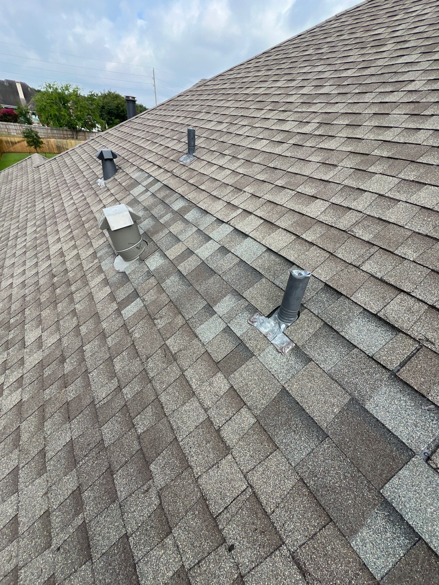 Hail Damage using Owen's Corning Duration (Lifetime) Shingles by Roof Repair Company