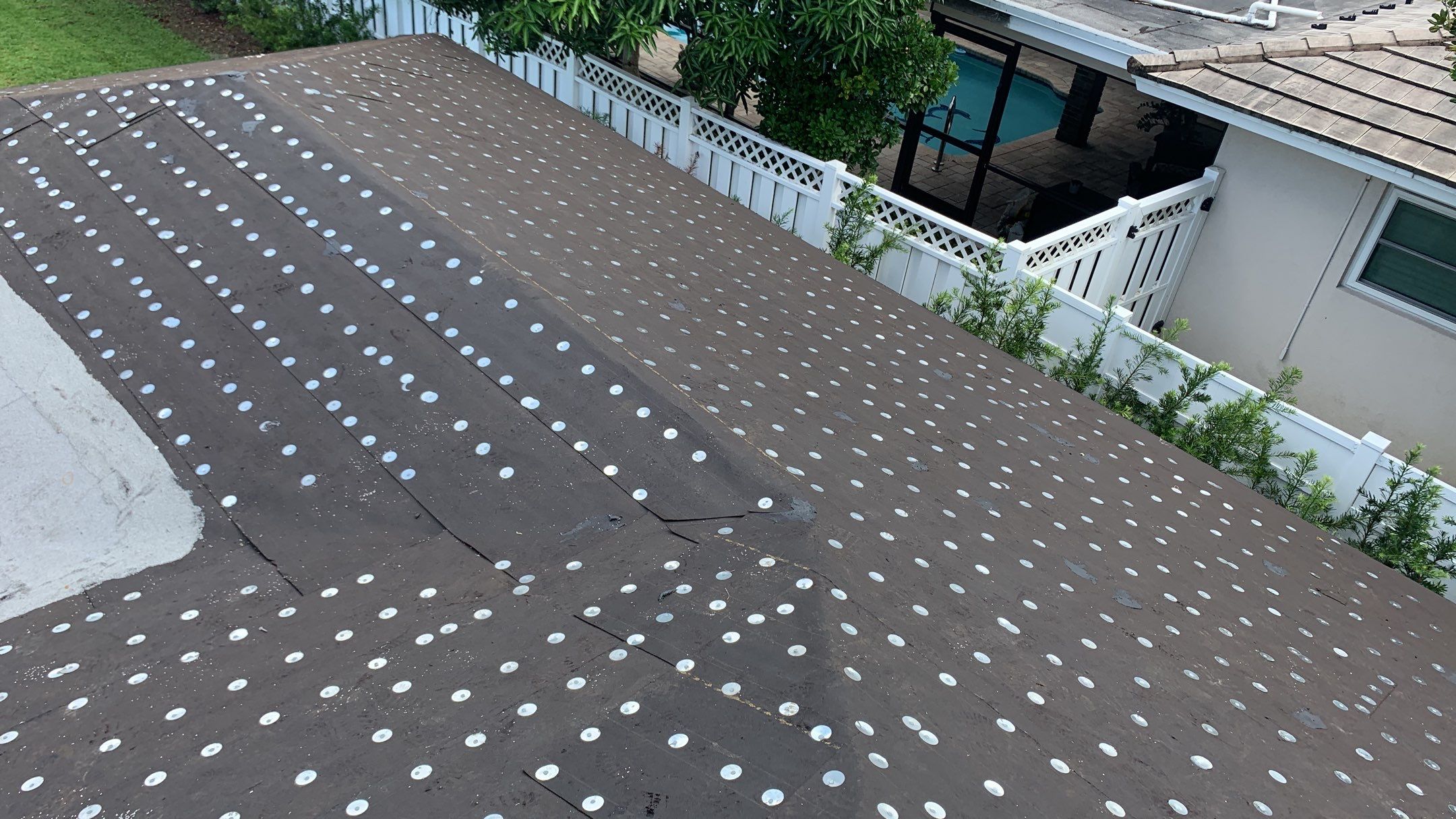 Residential Roofing Installation using 1" Nail strip metal roof by BLUES BROTHERS ROOFING