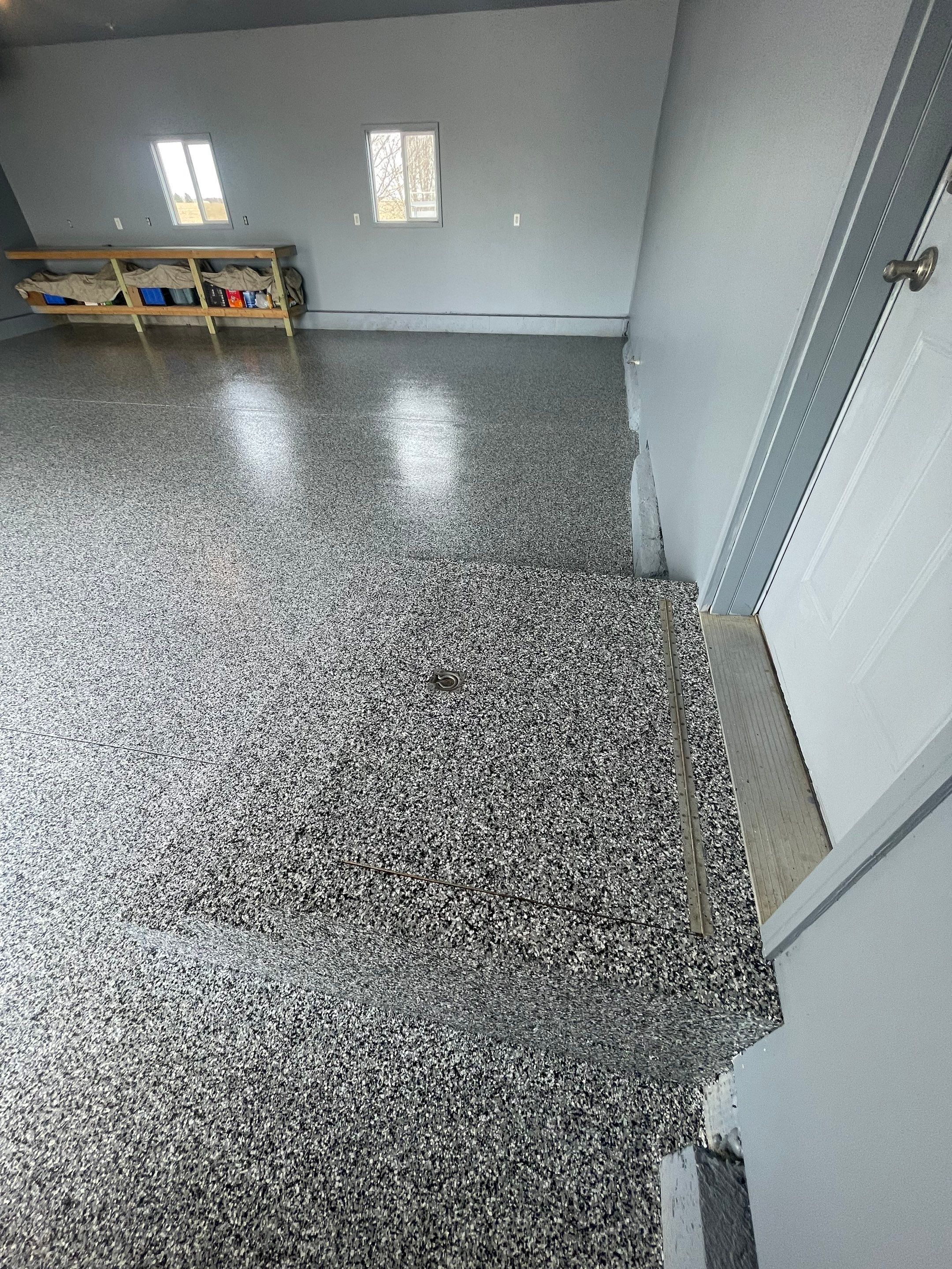 Grey Granite-Style Garage Floor Coating and Stairs in Hartford by Select Painting, Coatings & Garage Cabinets