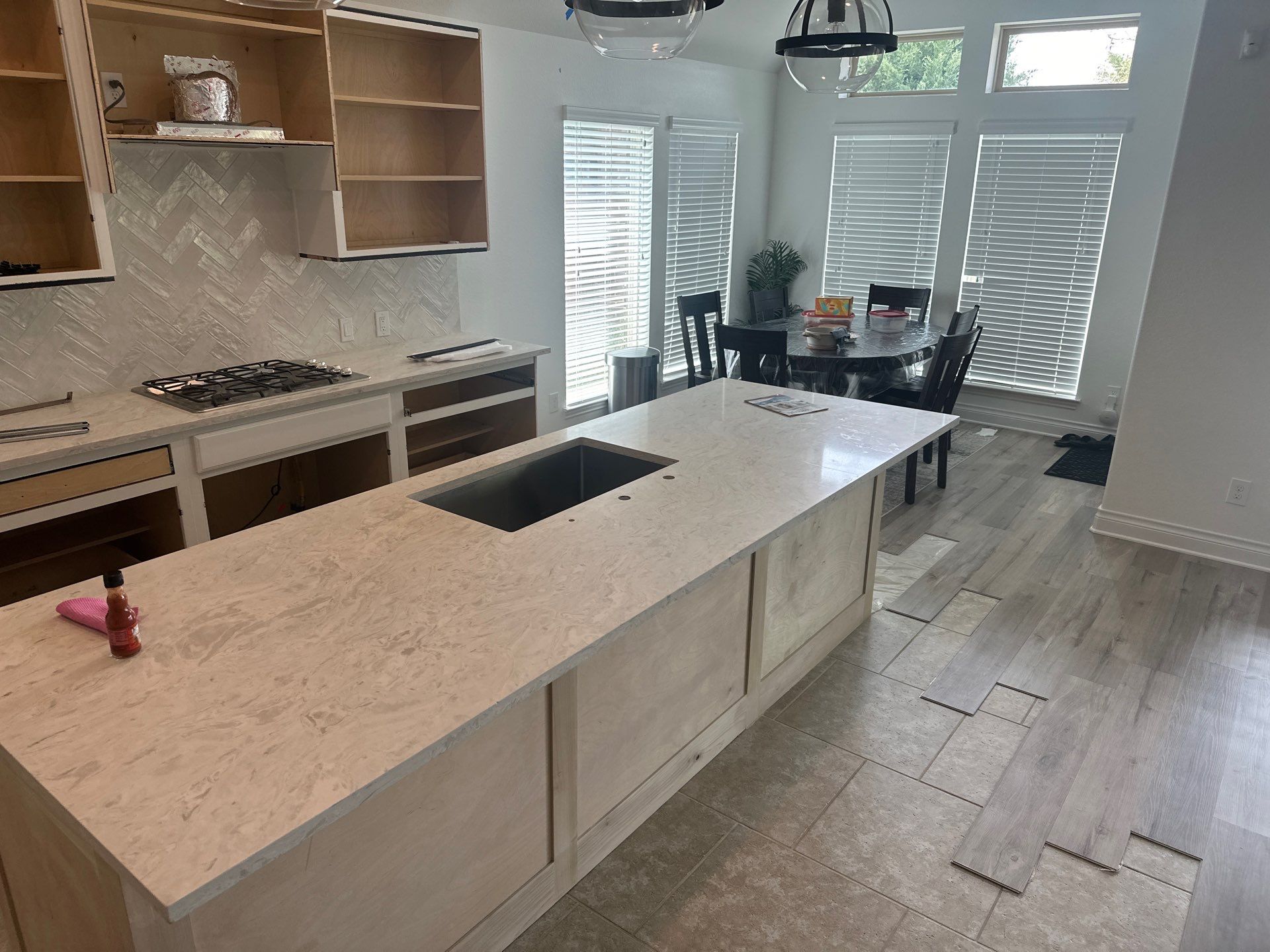 Kitchen Remodel using Water mitigation equipment by L&T General Contractors and Restoration INC