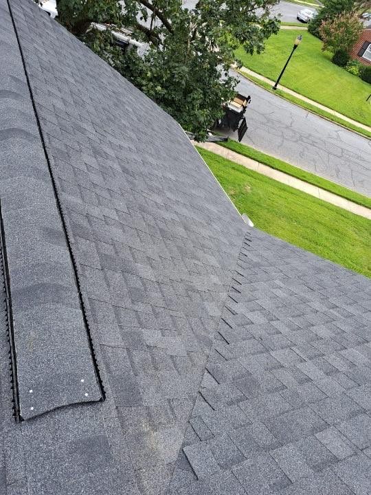 Residential Roofing Installation using Atlas Pinnacle Pristine Black Architectural Shingles by Frederick Roof Repair
