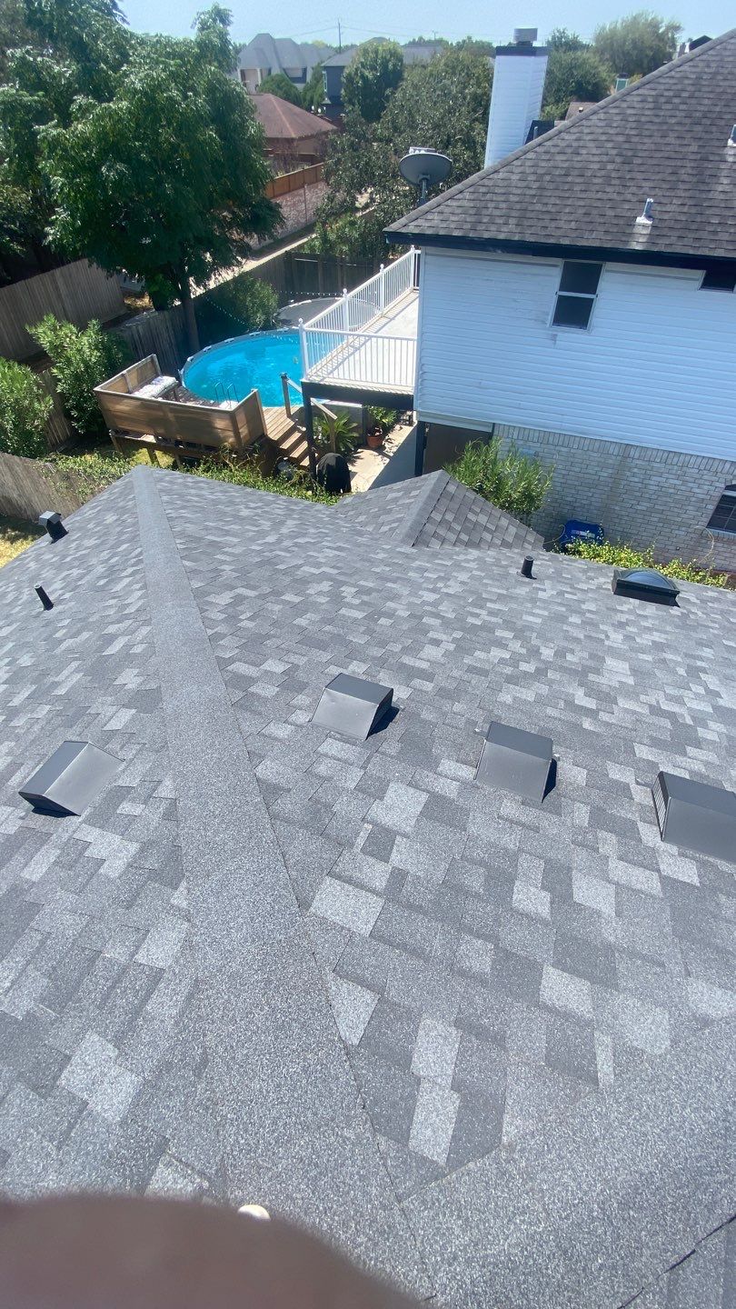 Nothing looks nicer than a little black roof by Bayfront Roofing and Construction