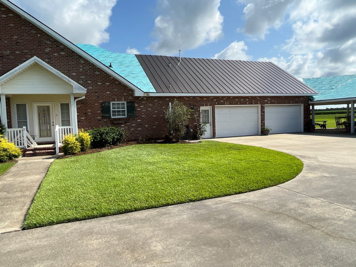 Standing Seam Metal Roof Installation by Top Team Construction