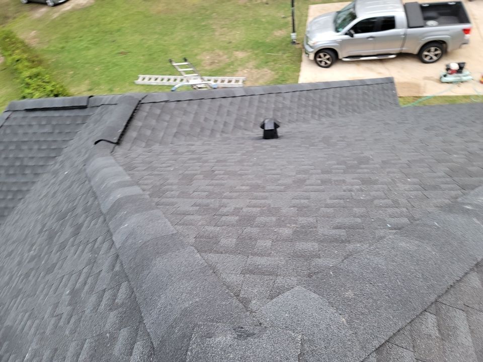 Residential Roofing Installation using Roof Replacement by American Roofing & Construction LLC