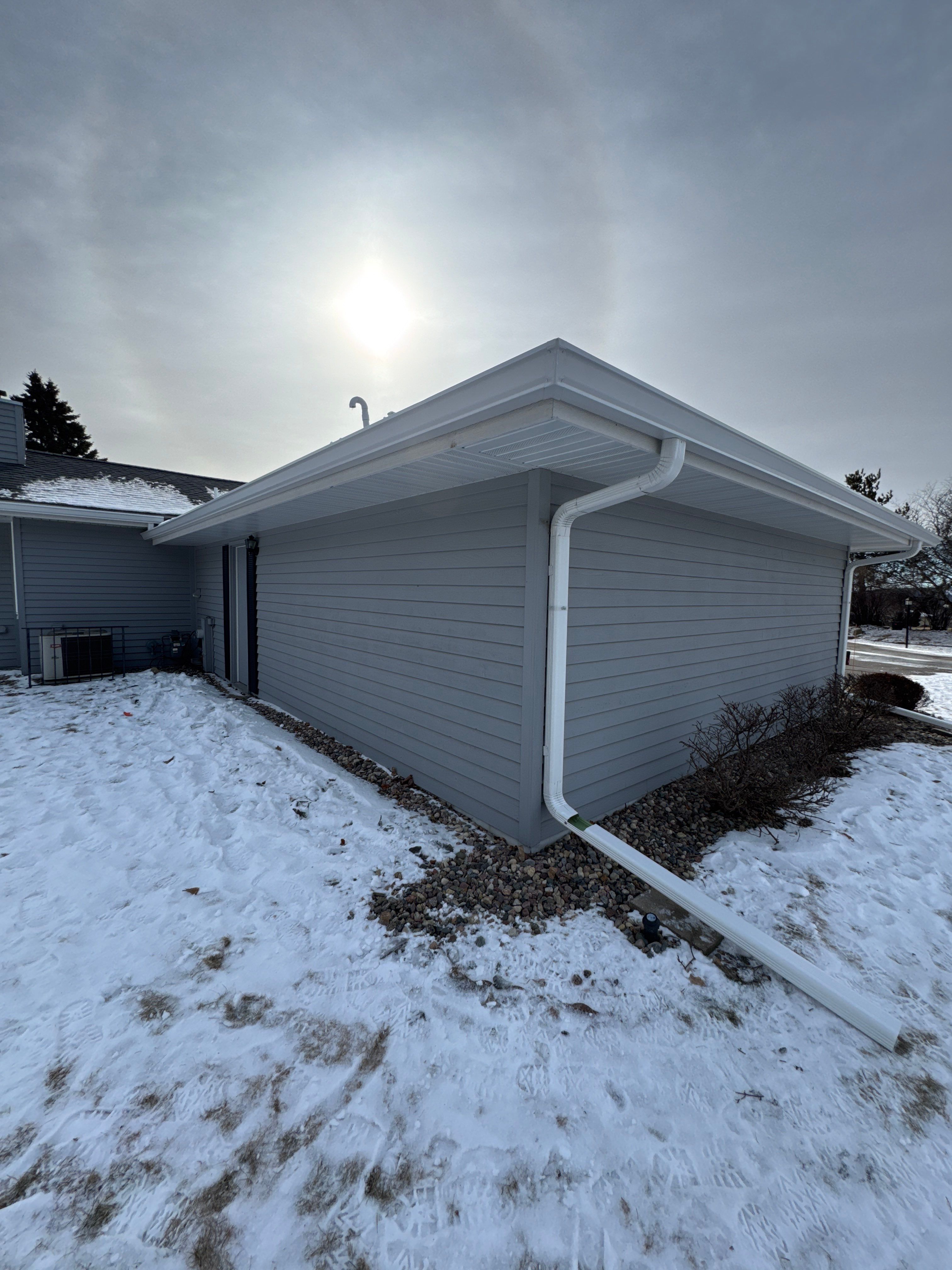 Residential Seamless Gutter Installation using 3"x4" Aluminum Downspouts by AA Seamless LLC