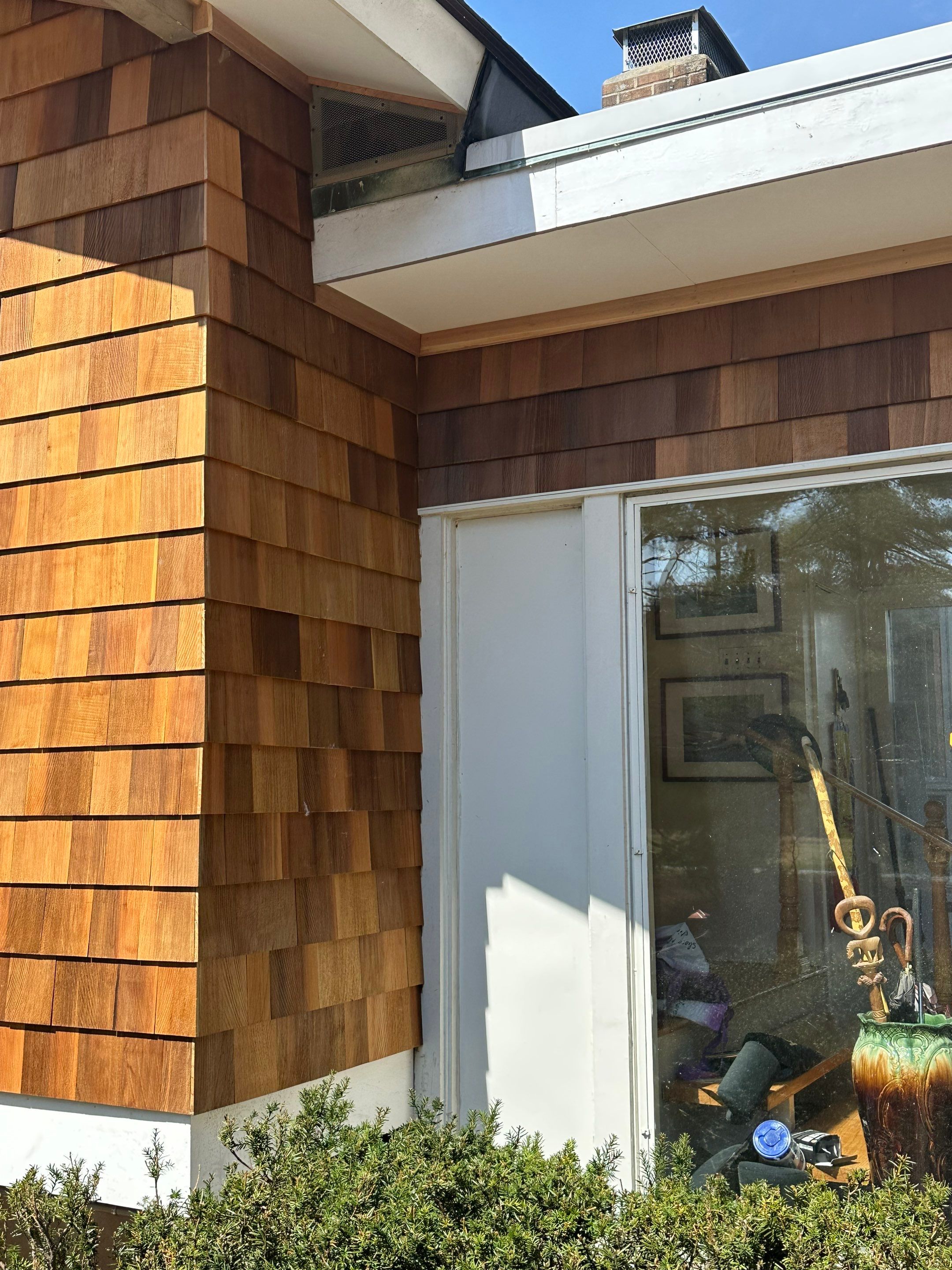 Siding Installation using Perfection Red Western Cedar Shingles  by Loyalty Exterior Solutions 