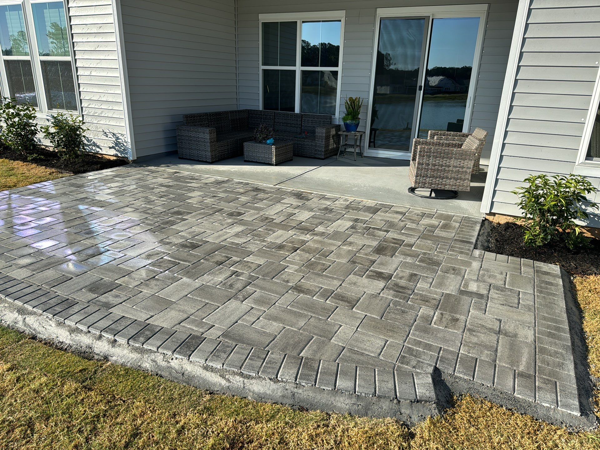 Custom Herringbone Paver Patio and Professional Landscaping in Bluffton by Lowcountry Scapes, LLC