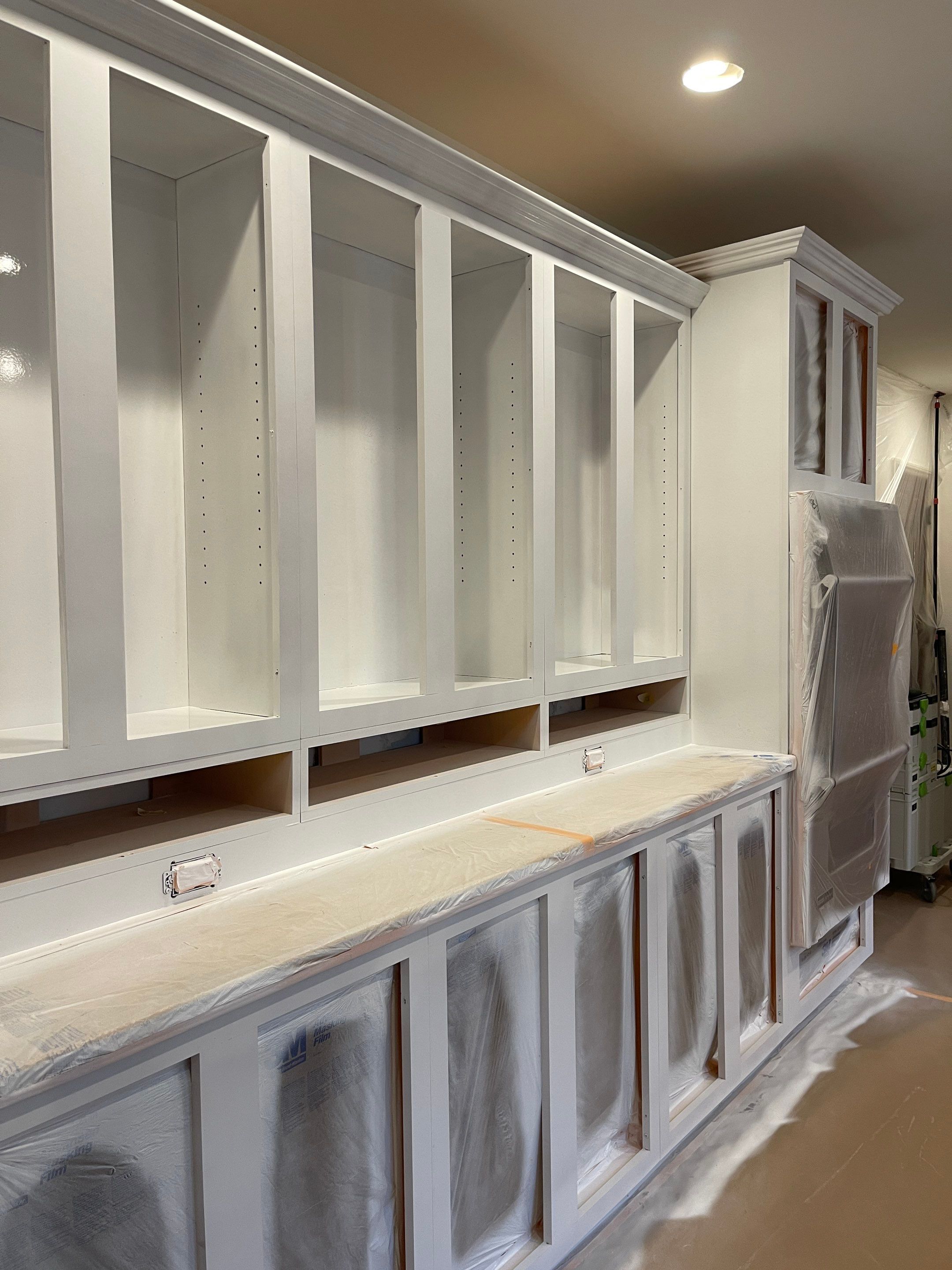 Kitchen Cabinet Painting using Milesi 2k by Trendy Walls Inc.