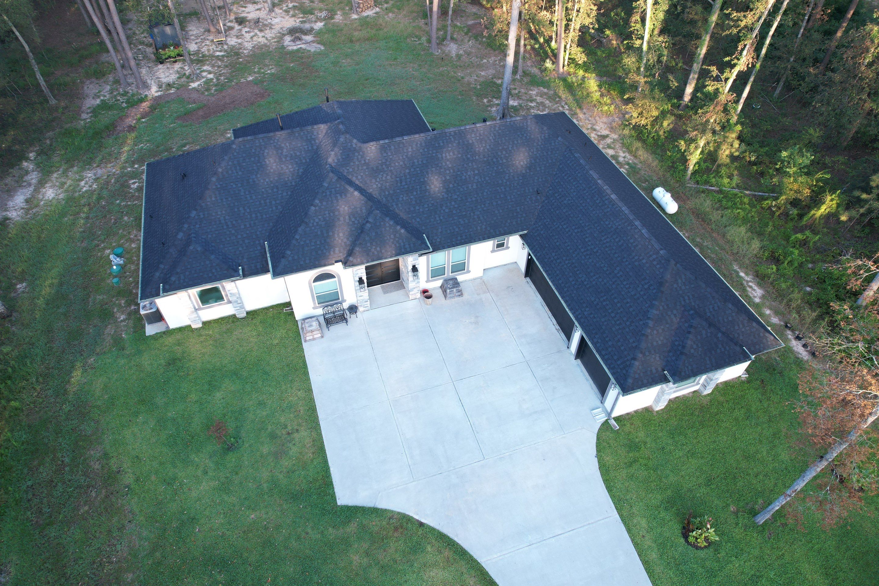 TAMKO Titan XT Rustic Black by STX Roofing