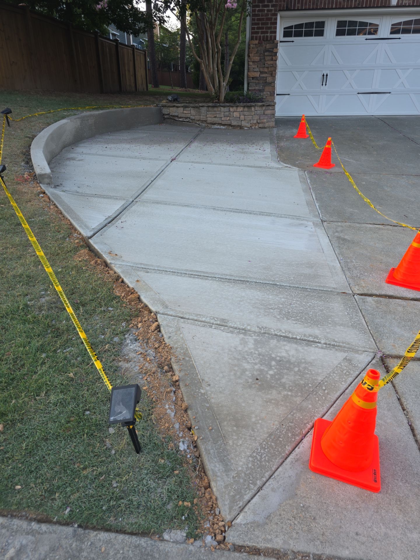 Concrete Driveway Expansion & Retaining Wall | Apex, NC by Elite Remodeling and Design LLC