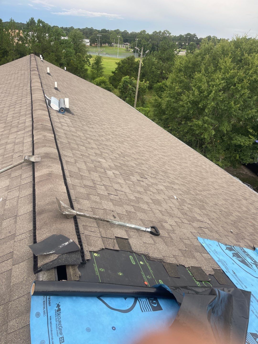 Residential Roofing Installation using Roof Replacement by American Roofing & Construction LLC