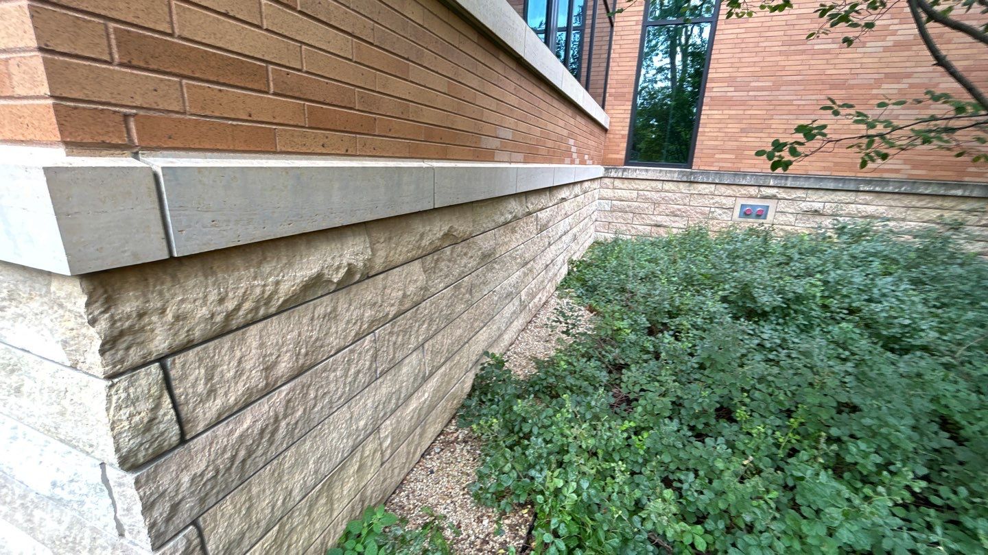 natural stone using Algaecide, soft wash soap by Northern Power Washing LLC.