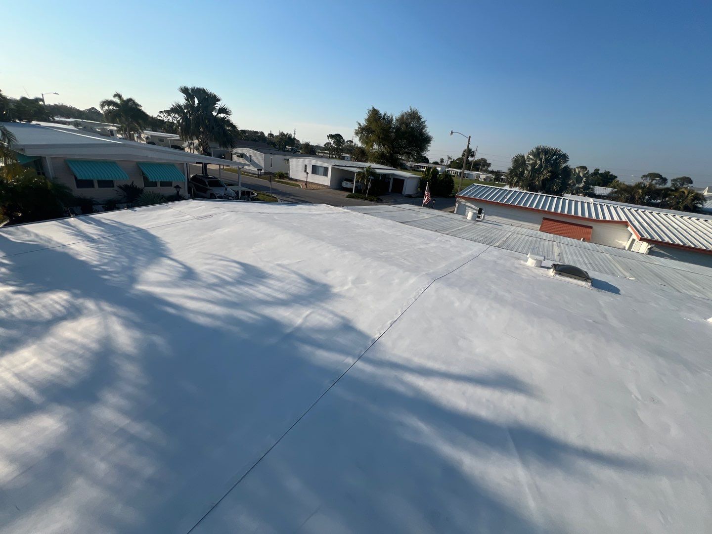 Residential TPO and Skylight Installation by Four Peaks Roofing