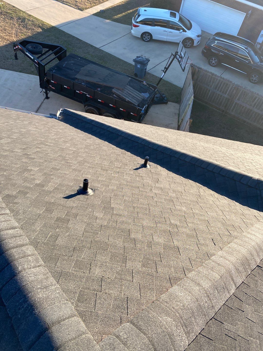 Residential Roofing Installation using Roof Replacement by American Roofing & Construction LLC