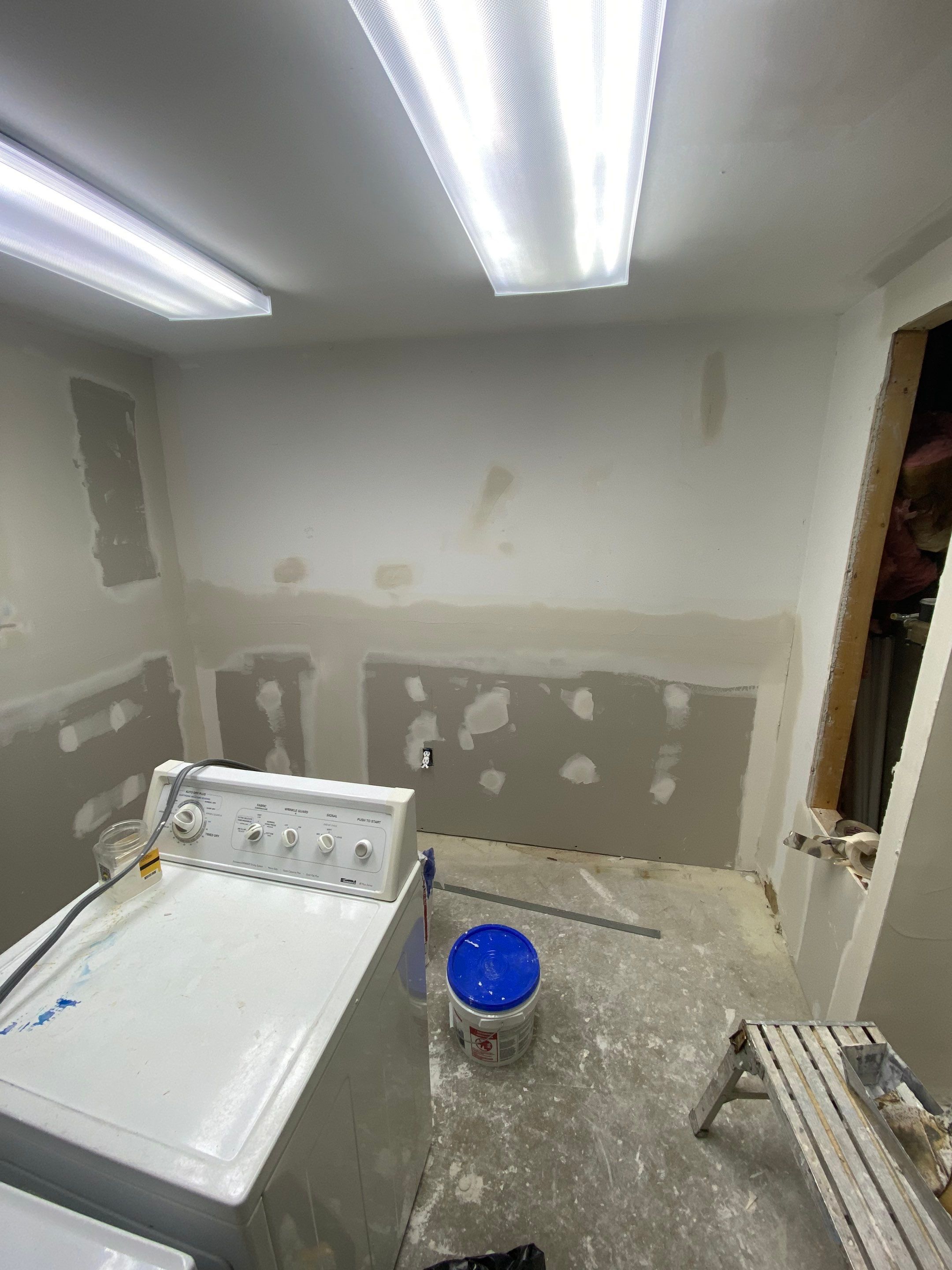 Laundry Room Redmodel using Lifeproof Luxury Vinyl Plank Flooring by The Smet Companies, LLC