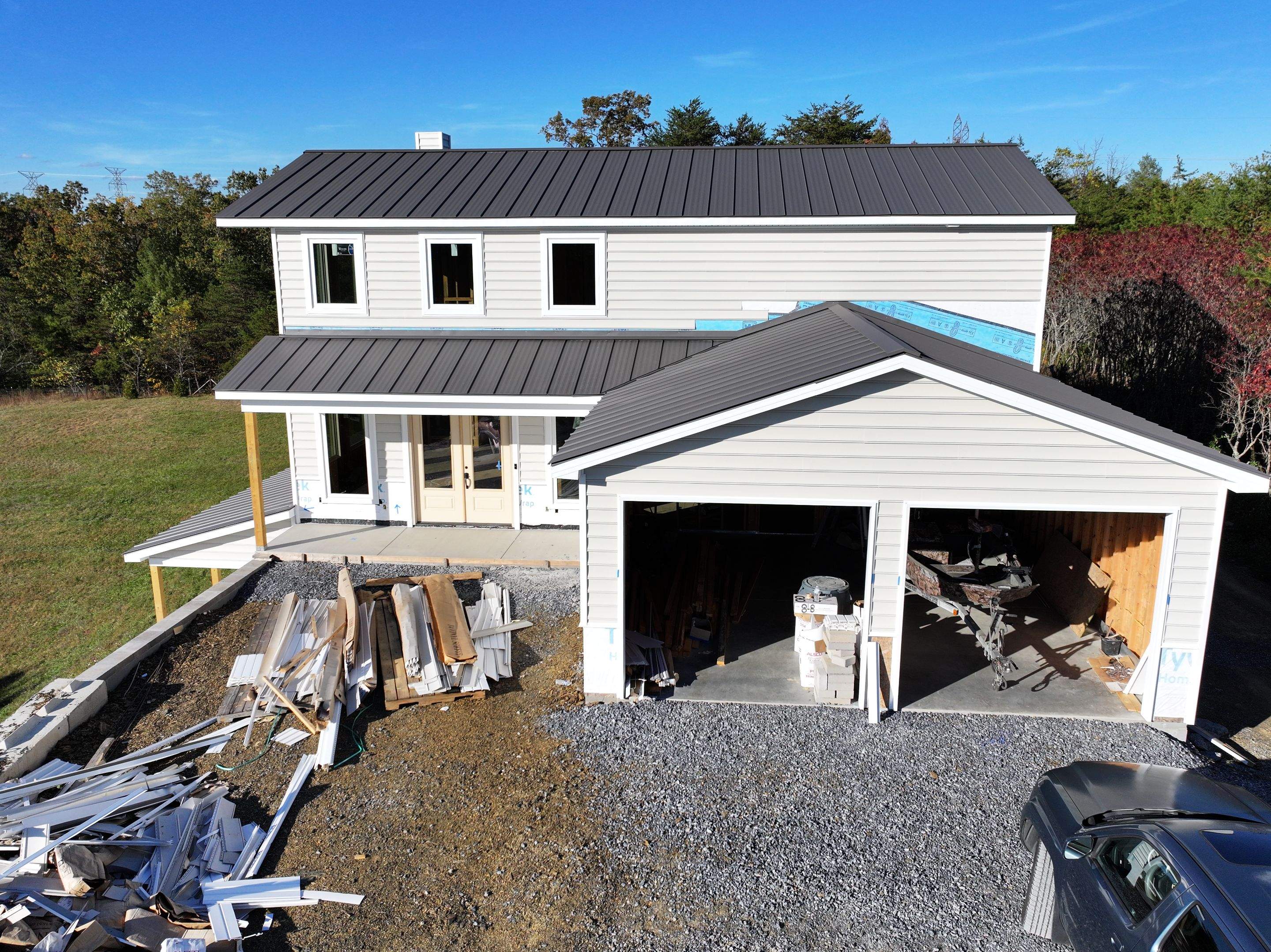 Textured Charcoal Gray Standing Seam by Omnia Roofing