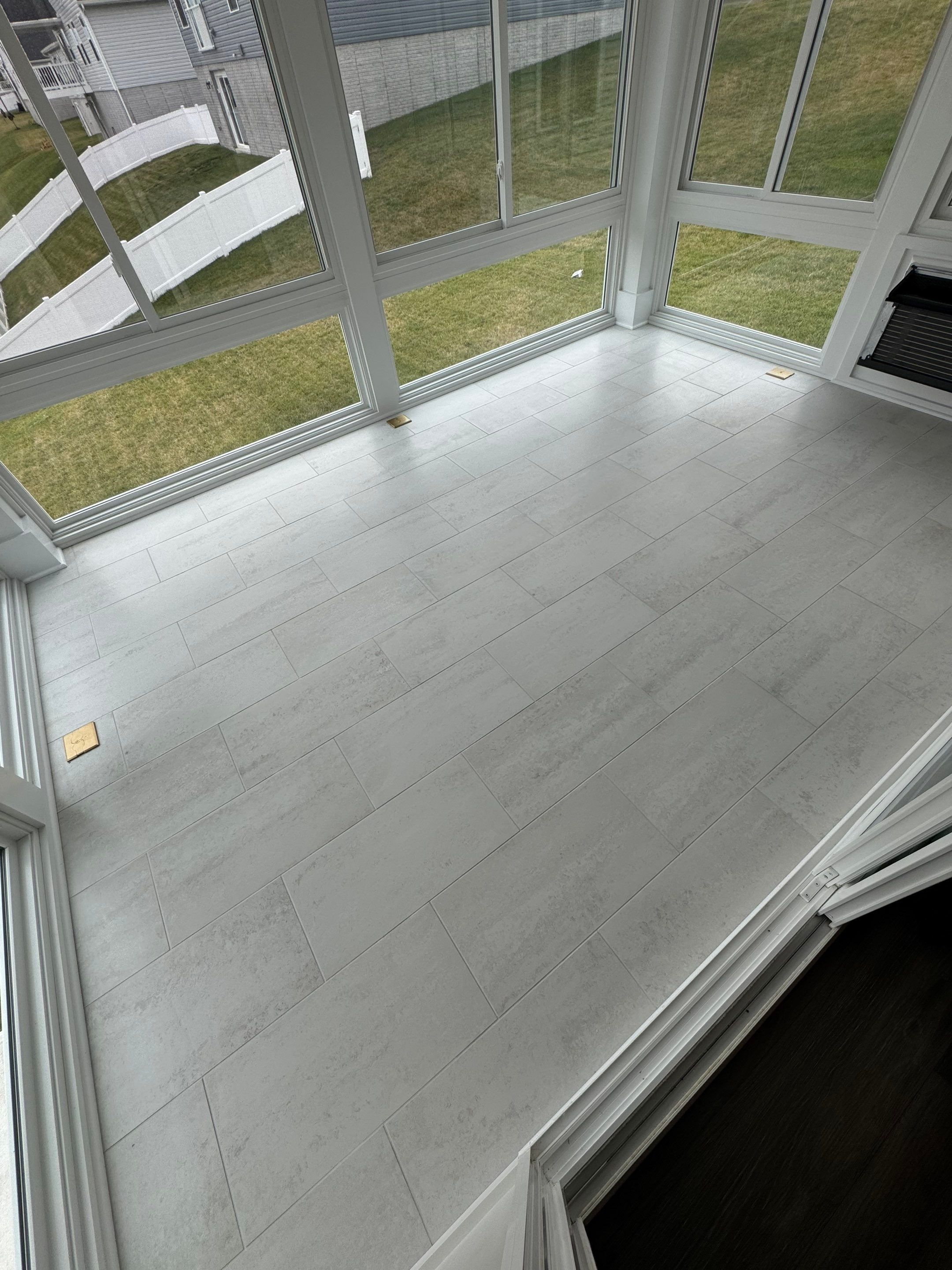 Dillard Sunroom by Integrity Tile and Home LLC