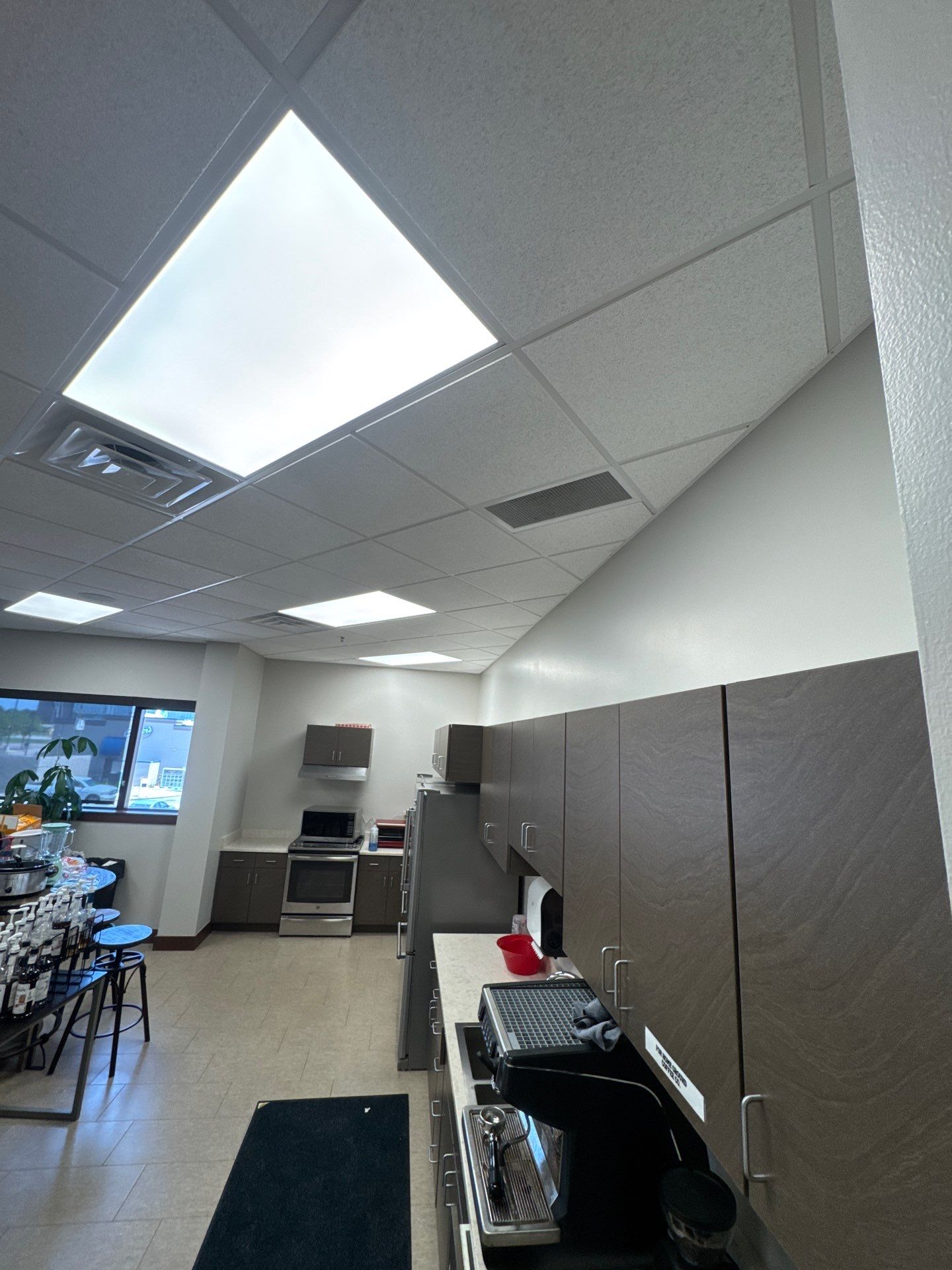 Commercial Office Interior Remodel and Modern Suite Refresh in Sioux Falls by Select Painting, Coatings & Garage Cabinets