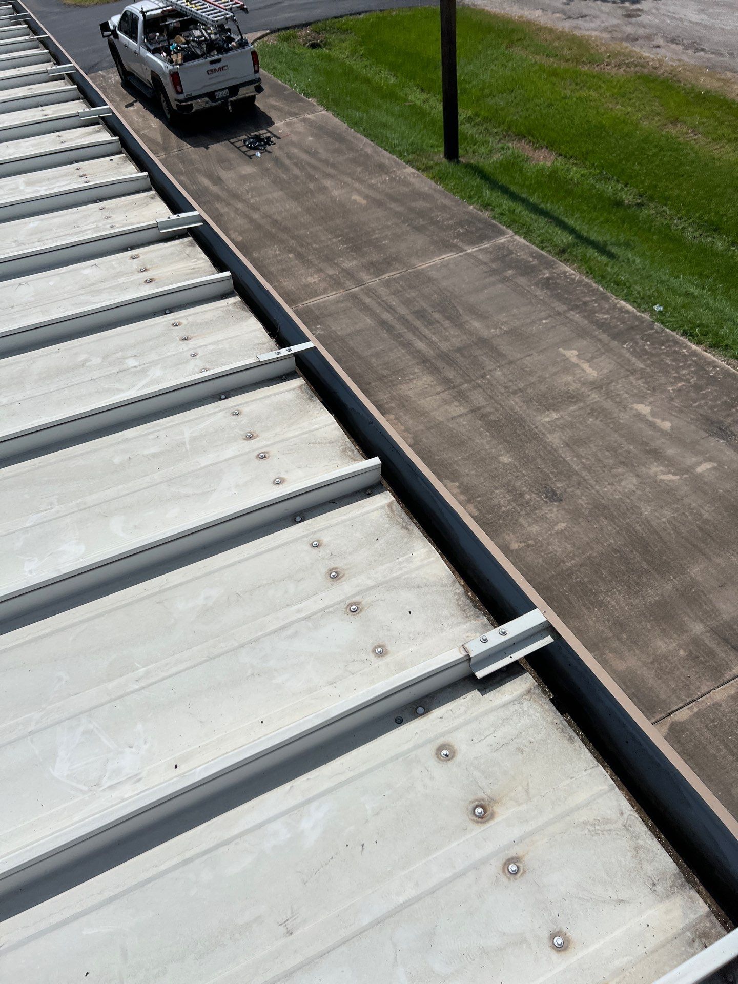Commercial Roofing Repair using Metal by Roof Repair Company