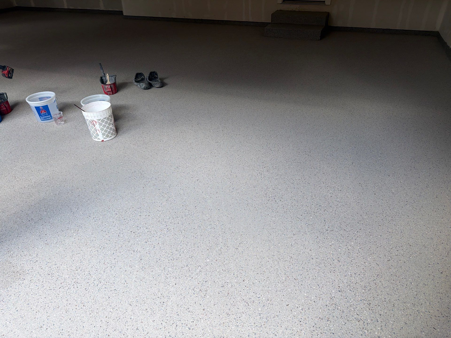 Hudsonville Garage Renovation Featuring Finished Drywall and Flake Epoxy Floors by Gordon Painting