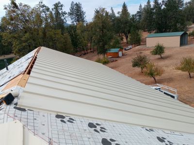Residential Roofing Installation using Standing seam metal roofing system