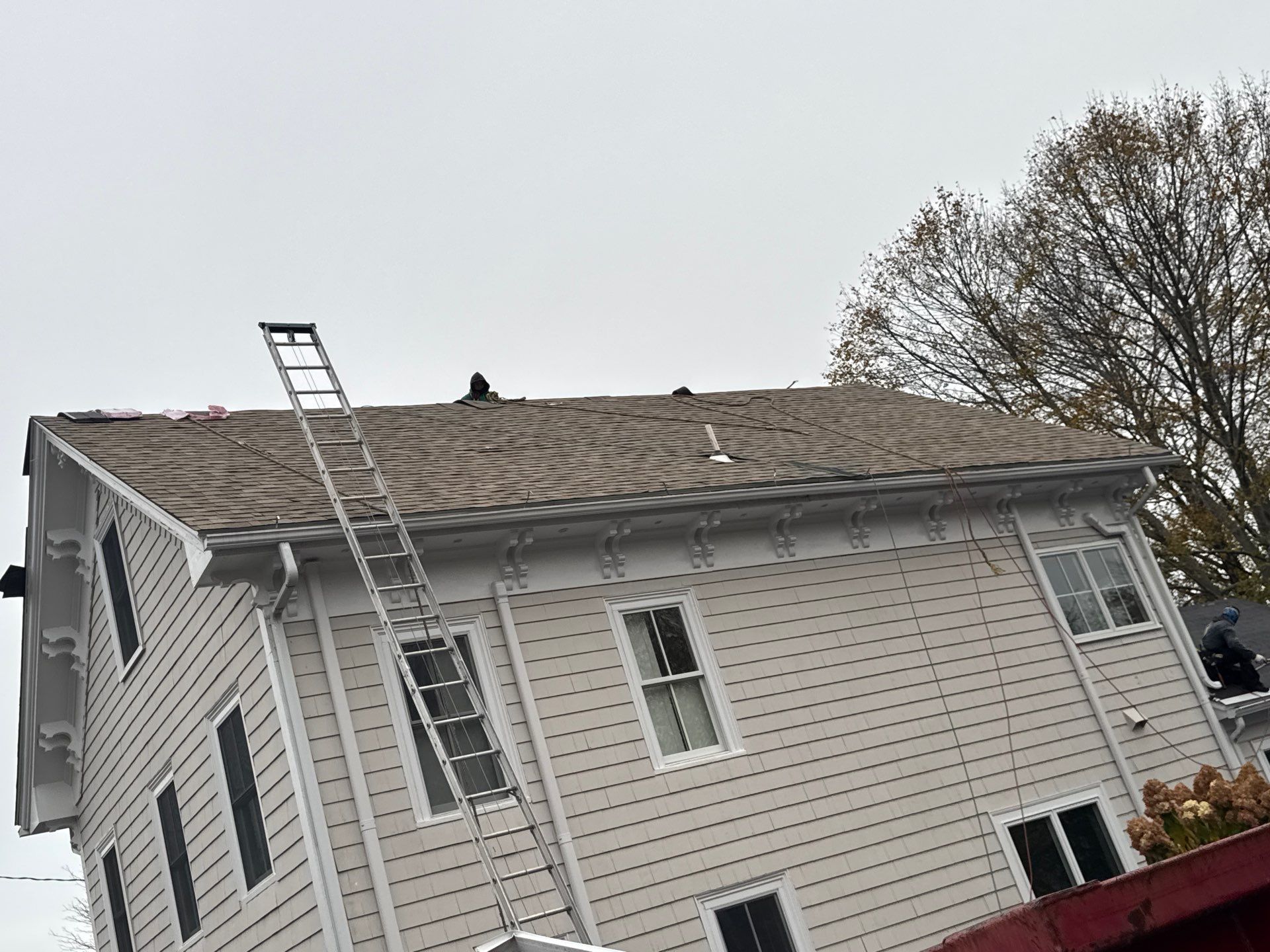 Newburyport Complete Roof Replacement with Solar Venting Skylight by Mighty Dog Roofing of Greater Middlesex County