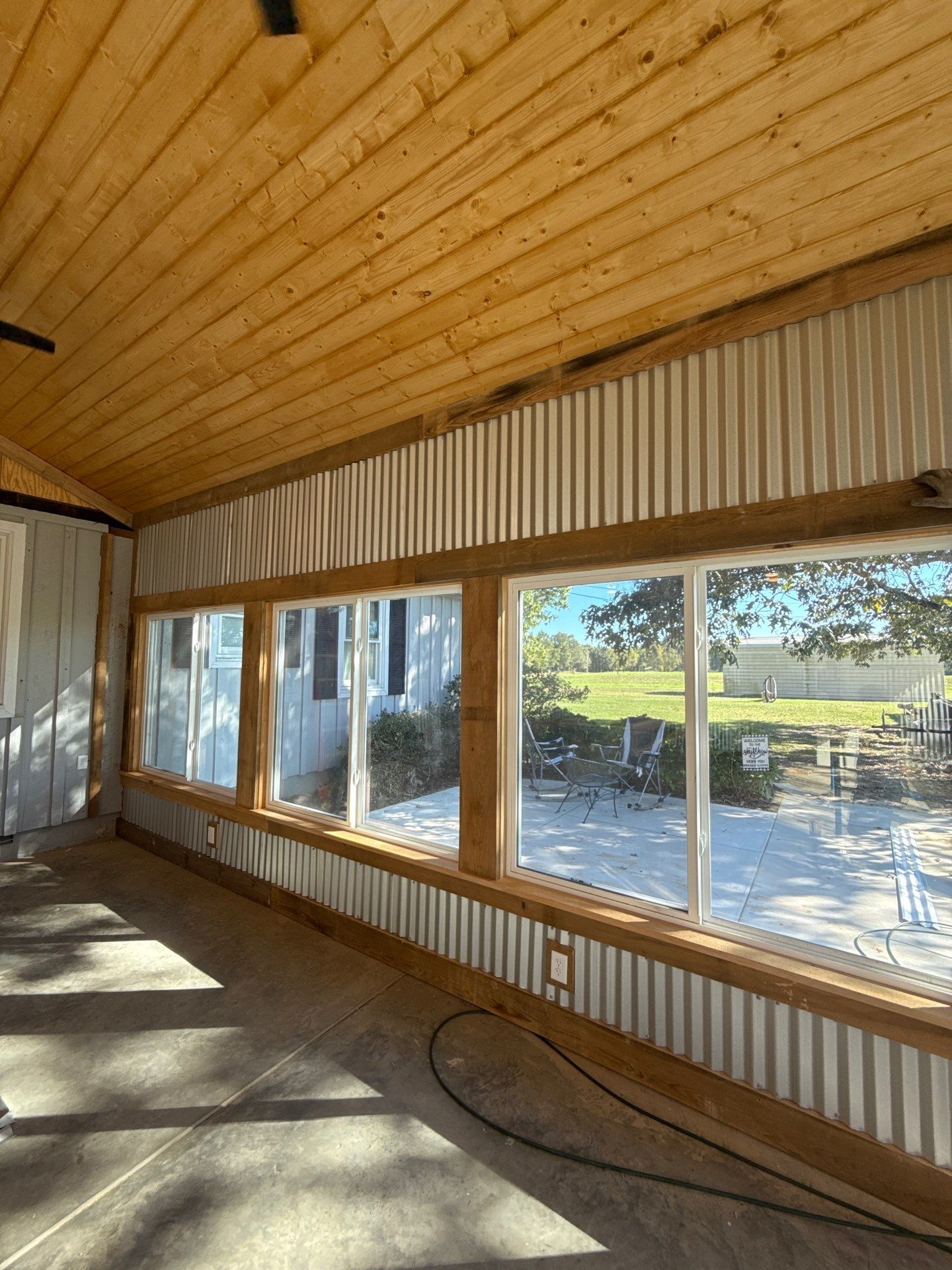 Sunroom and Garage Addition by Skilled Construction LLC
