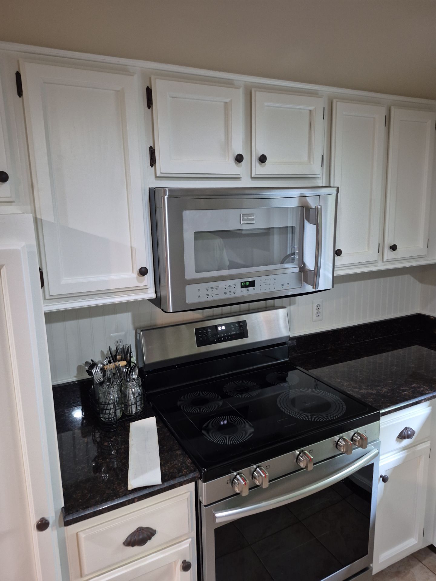 Kitchen Cabinet Refinishing Upgrade in Shelby Township by Top Shelf Painter