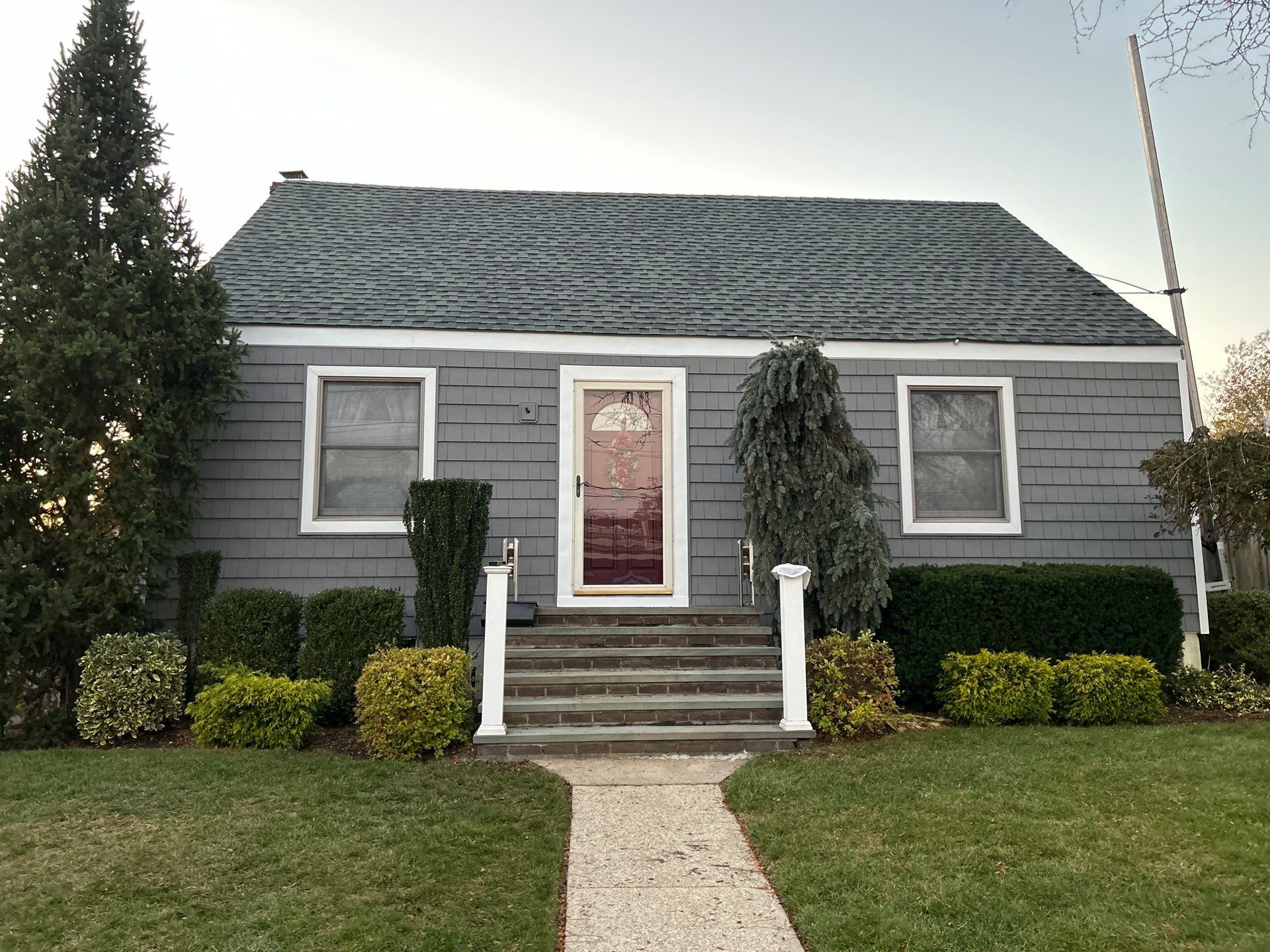 "Levittown Beauty Unveiled: A Siding Transformation Story" by Nisi Home Improvement