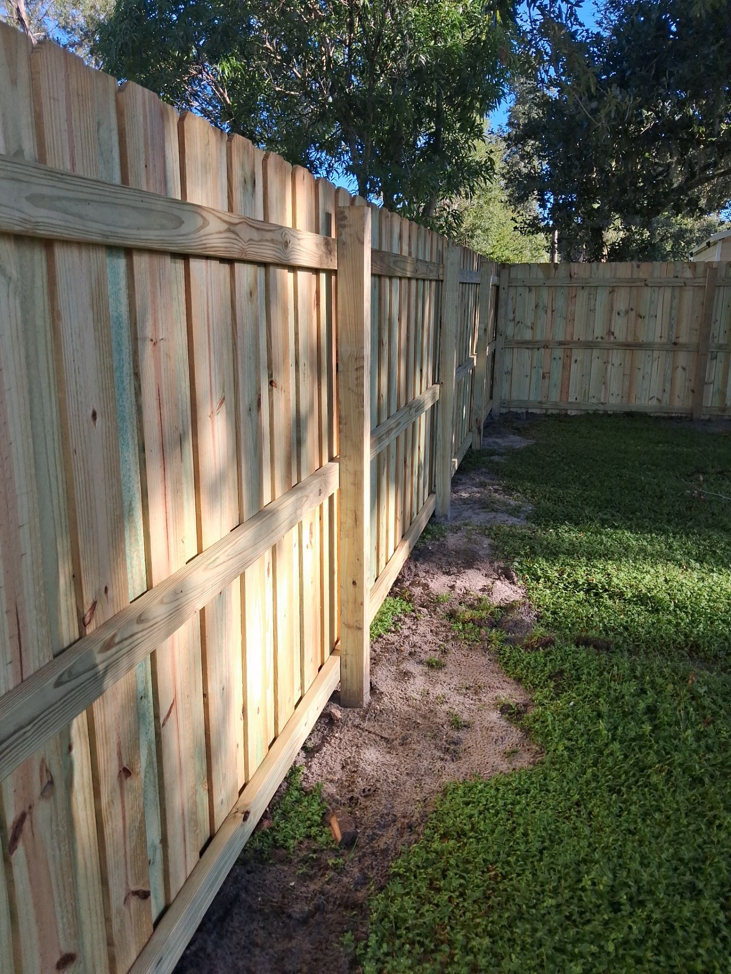 Pressure-Treated Wood Privacy Fence and Gate Installation in North Port by True Fence LLC