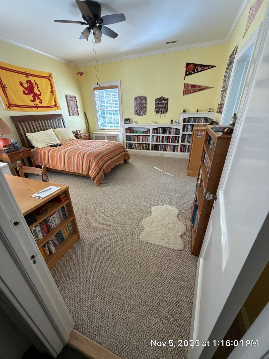 Two bedrooms with hardwood under carpet by Accent Custom Floors