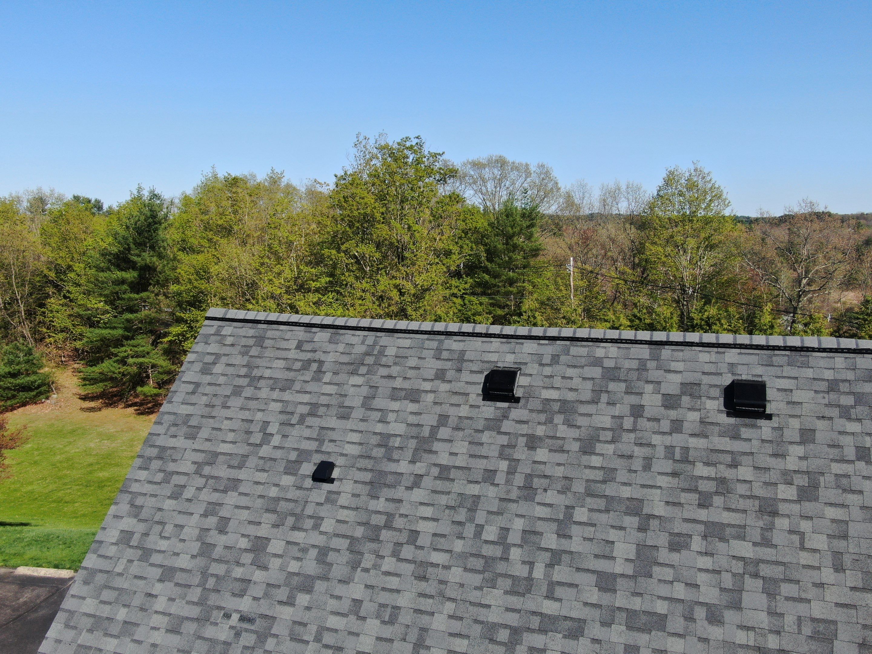 Roof Replacement in Littleton, MA by Mighty Dog Roofing of Greater Middlesex County